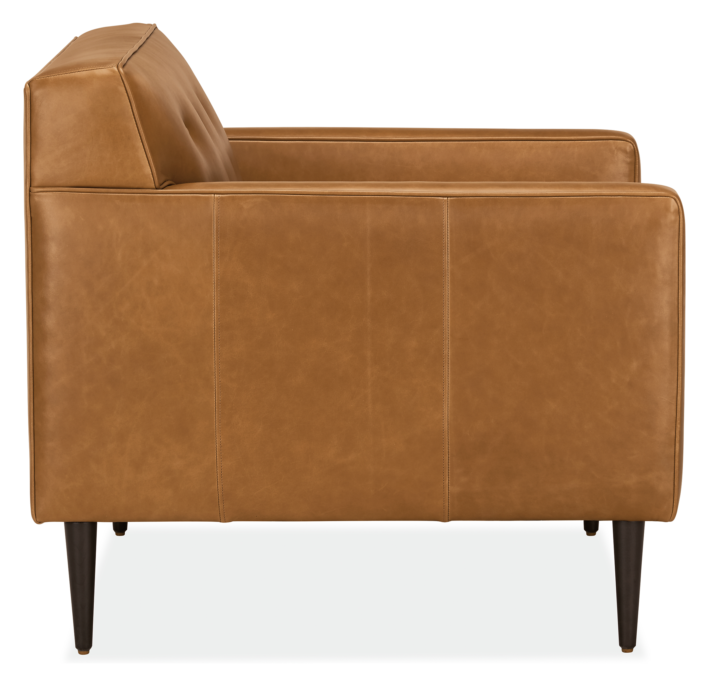 Side view of Holmes chair in portofino cognac leather.