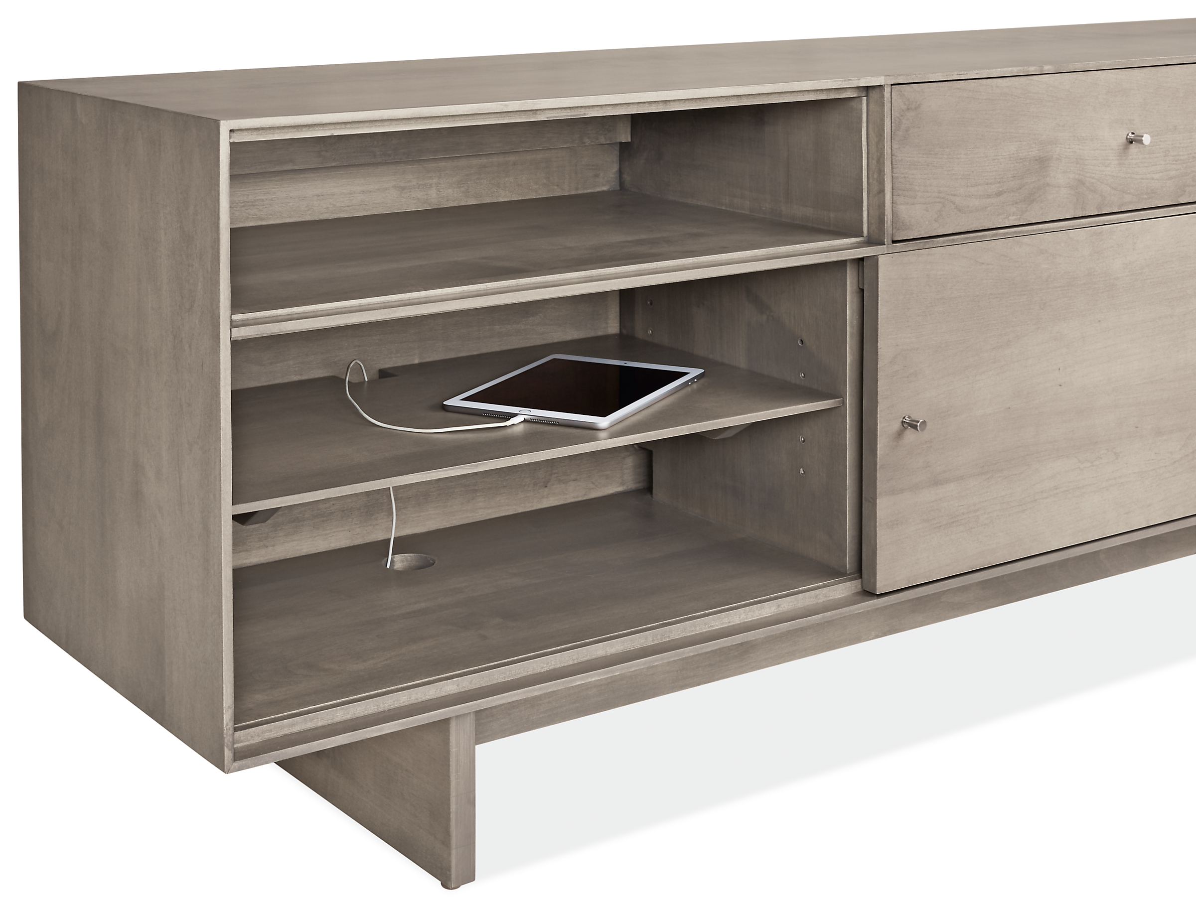 Detail of Hudson right-file drawer bench with tablet plugged into cabinet cord opening.