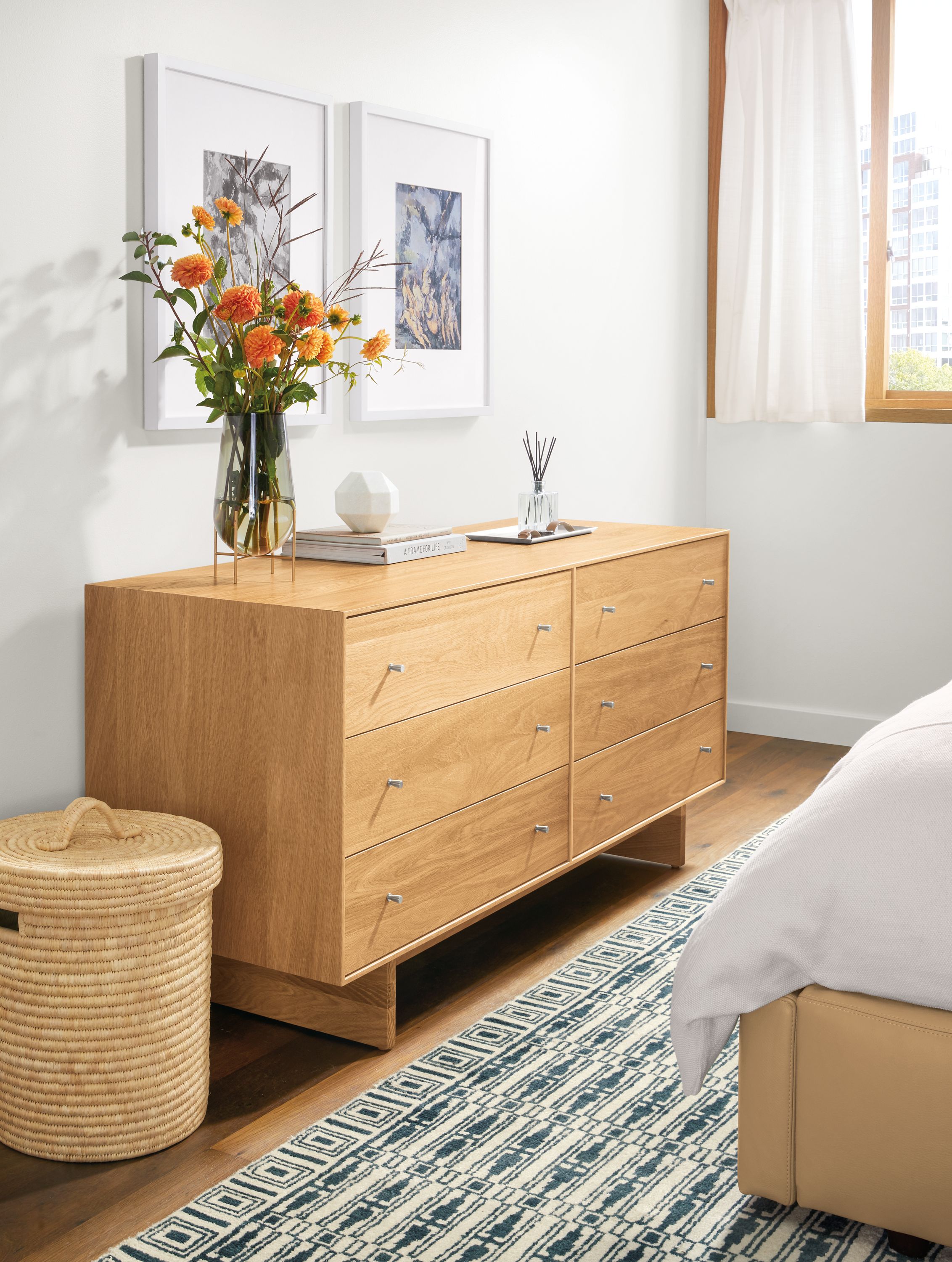 Detail of Hudson dresser with wood base in white oak in bedroom.