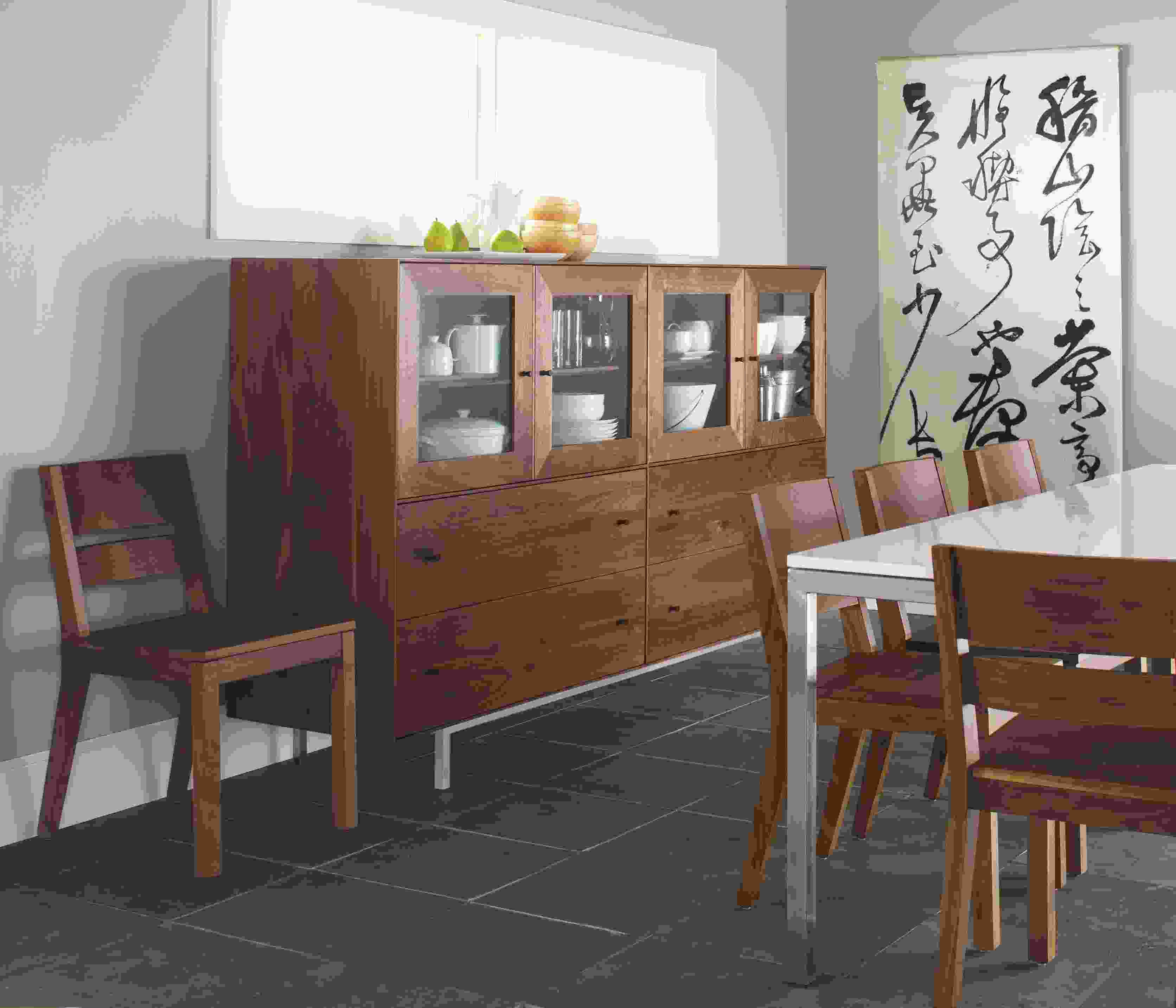 Dining room with Hudson Modular custom cabinet in walnut.