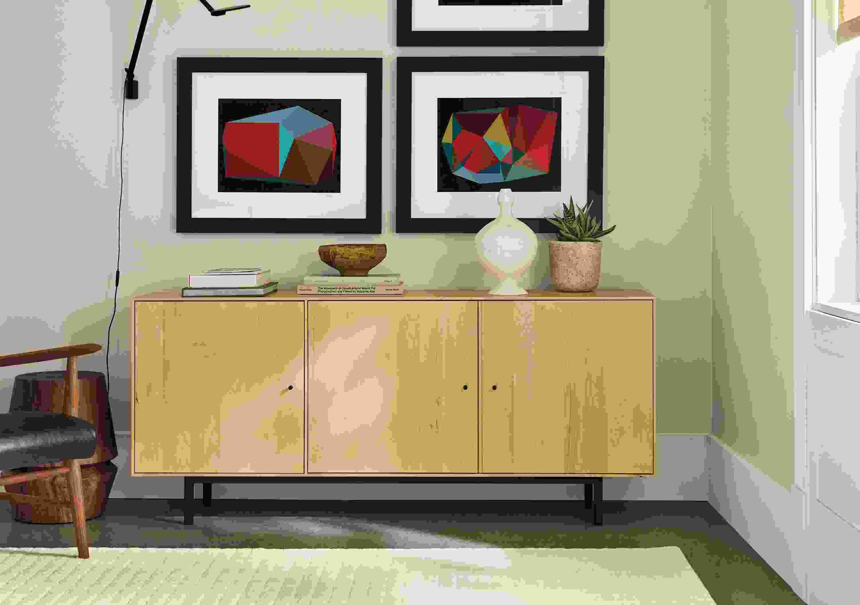 Room with Hudson custom 65-wide cabinet in maple, Safira rug in ivory and  3 Boissiere artwork pieces.