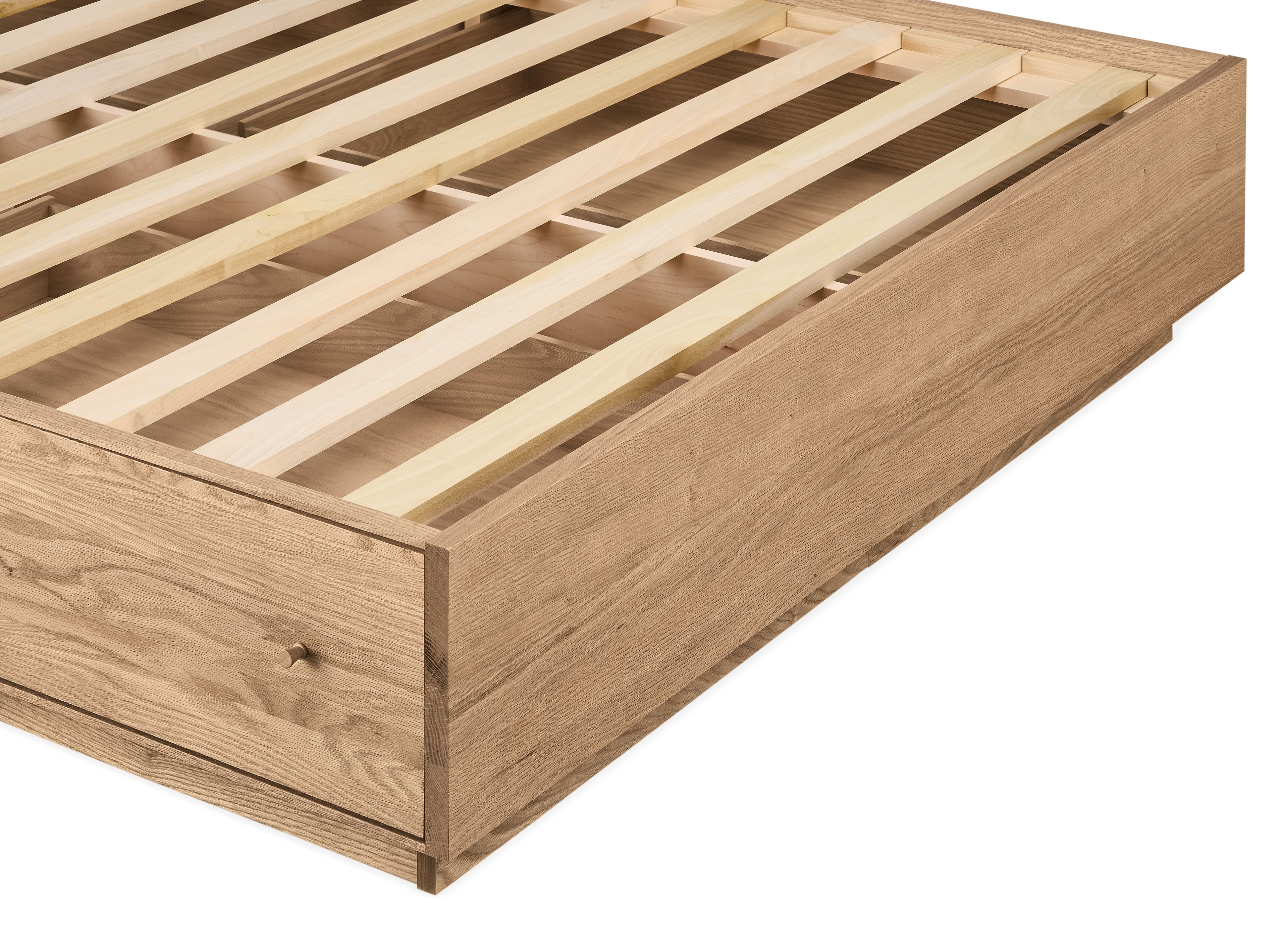 Corner detail of Hudson Queen Storage Bed in Rye showing slats.