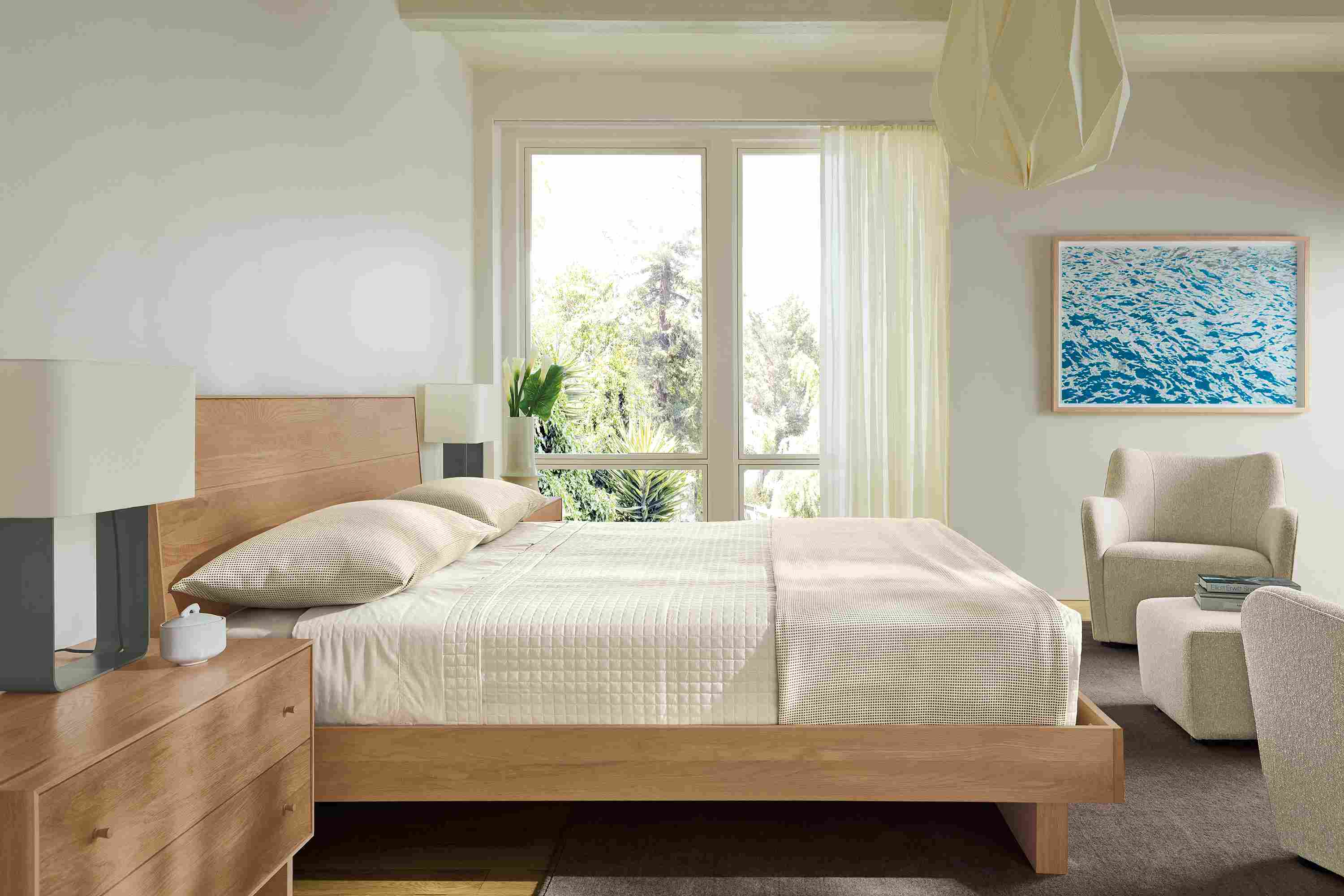 Bedroom with hudson king bed and 2 hudson nightstands all in Rye and 2 lily chairs in conley natural.