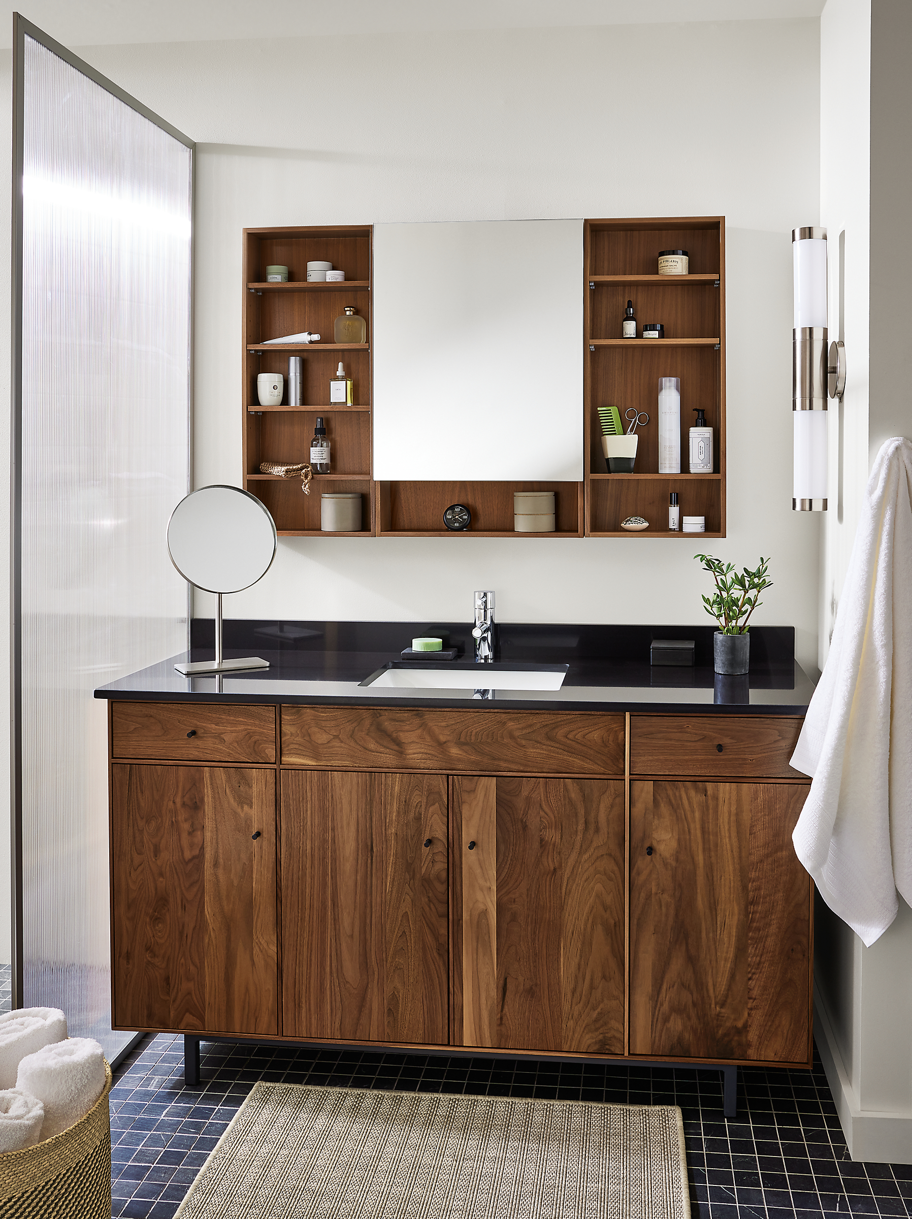Bathroom with Hudson 60-wide vanity in walnut with black quartz and Bridger 46.5-wide medicine cabinet in walnut.