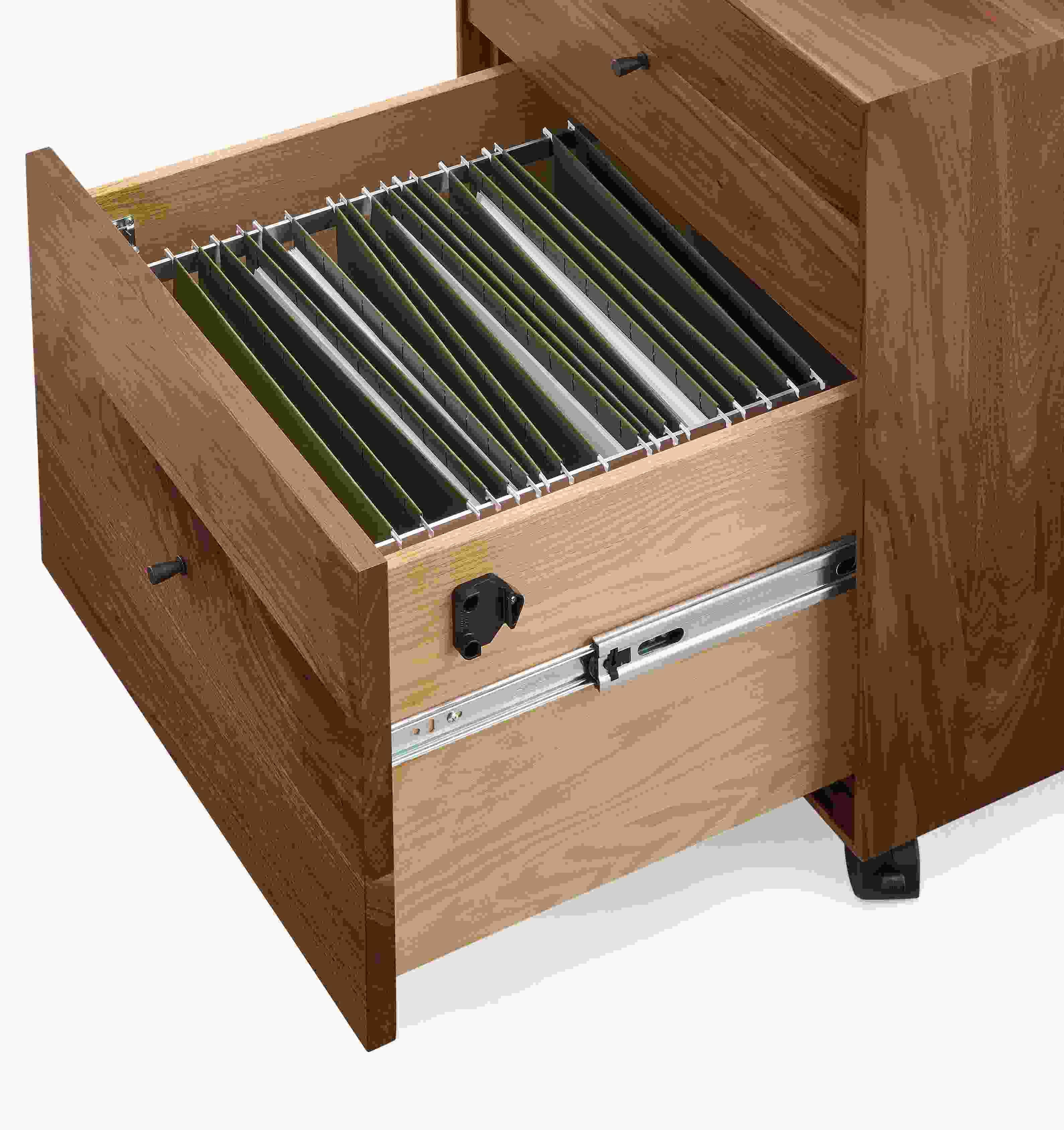 Detail of open-drawer on Hudson rolling file cabinet in walnut showing letter size file folders.