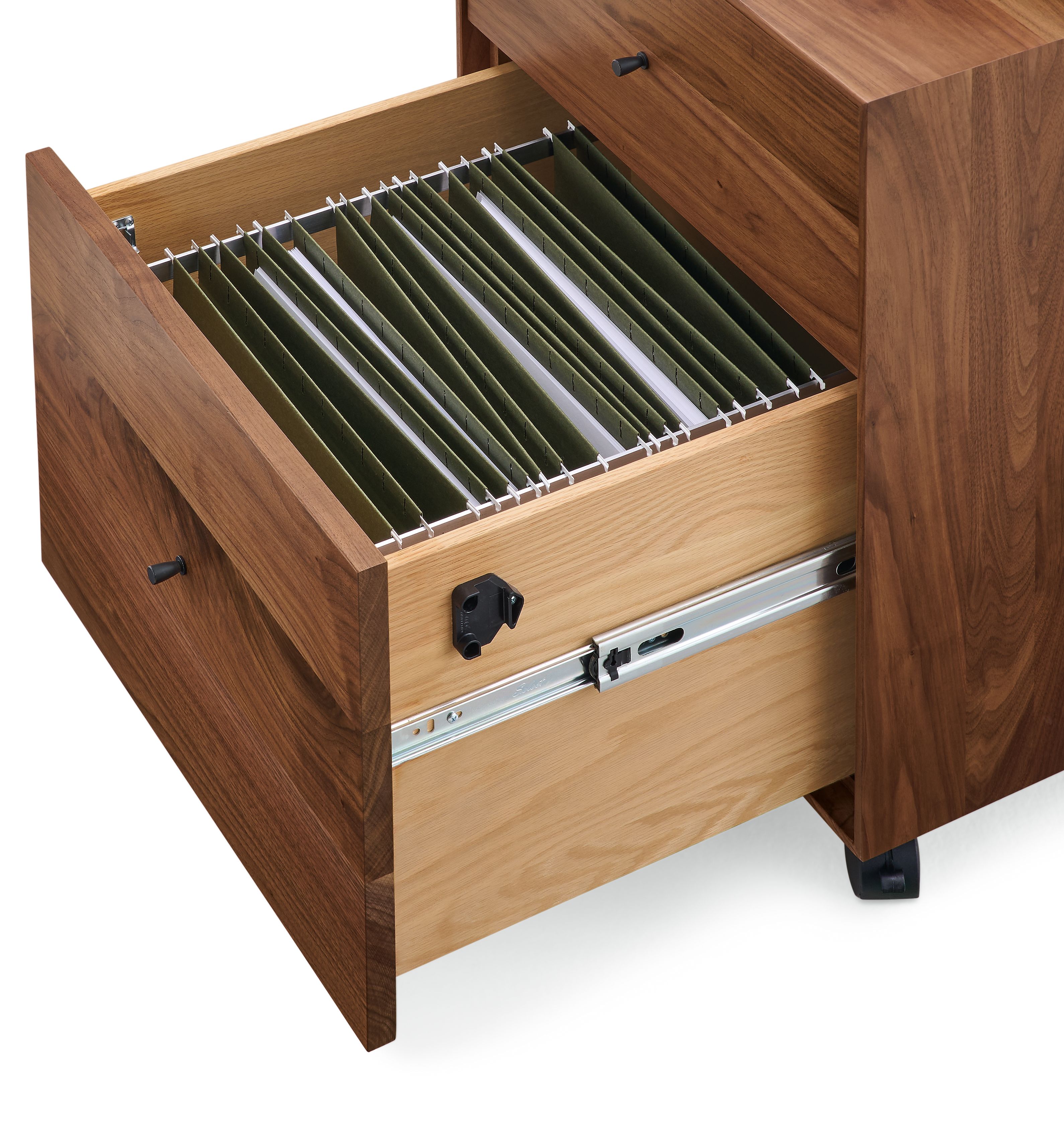 Detail of open-drawer on Hudson rolling file cabinet in walnut showing letter size file folders.