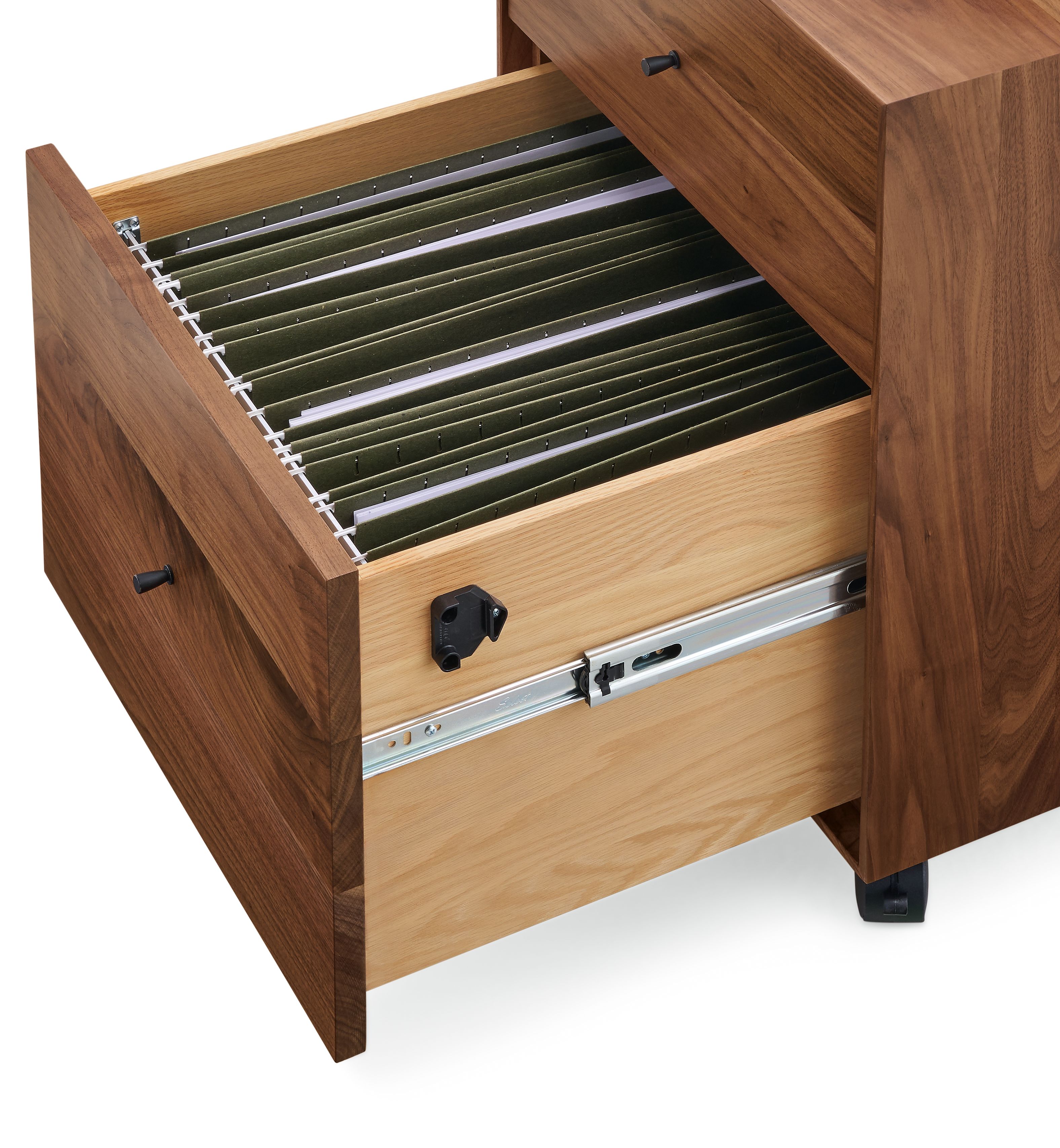 Detail of open-drawer on Hudson rolling file cabinet in walnut showing legal size file folders.