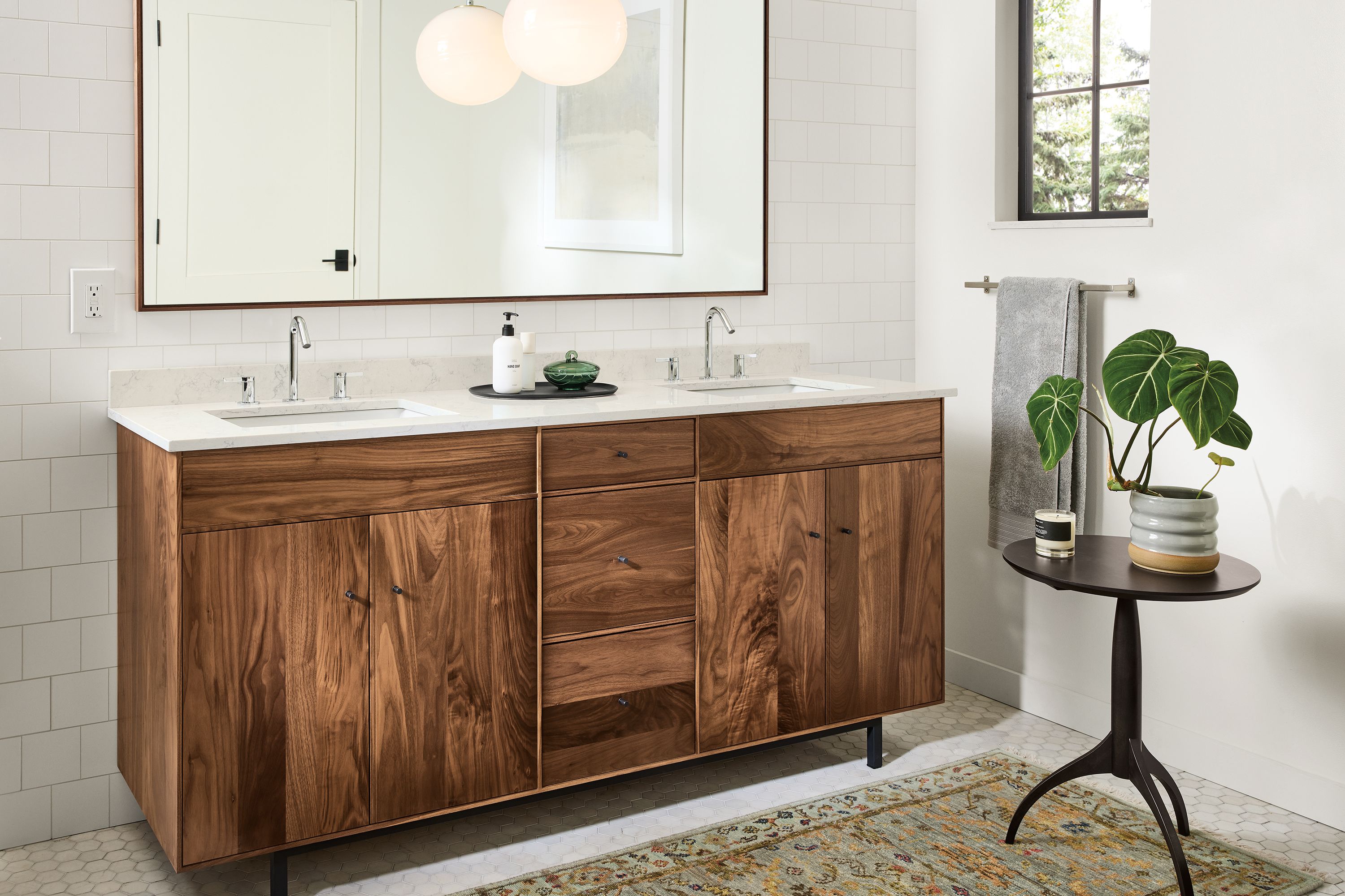 Barthroom with Hudson 72-wide double-sink vanity in walnut with marbled warm white quartz top.