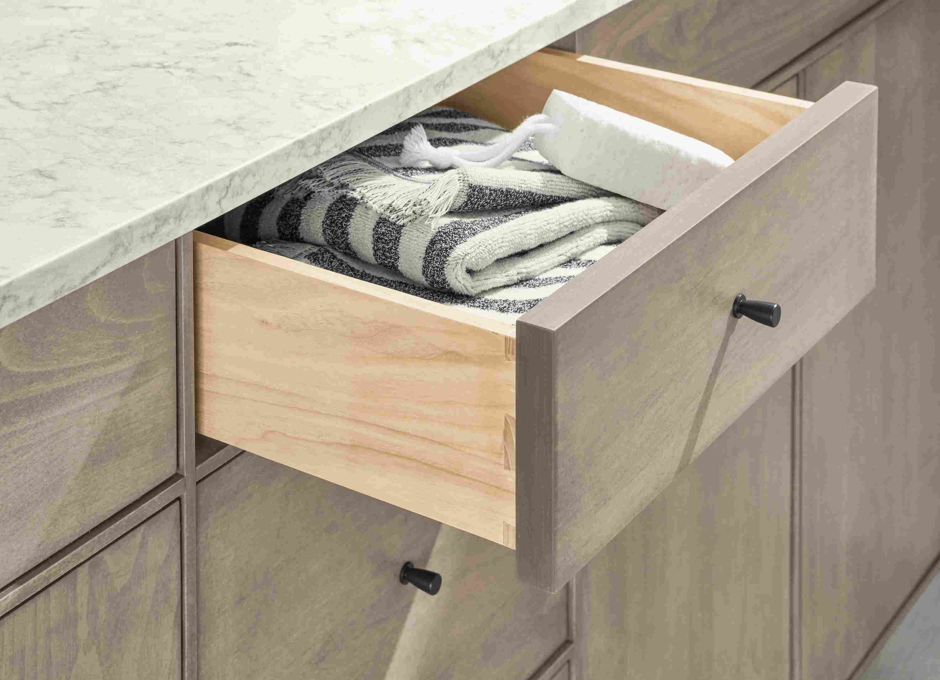 Detail of Hudson vanity with open drawer.