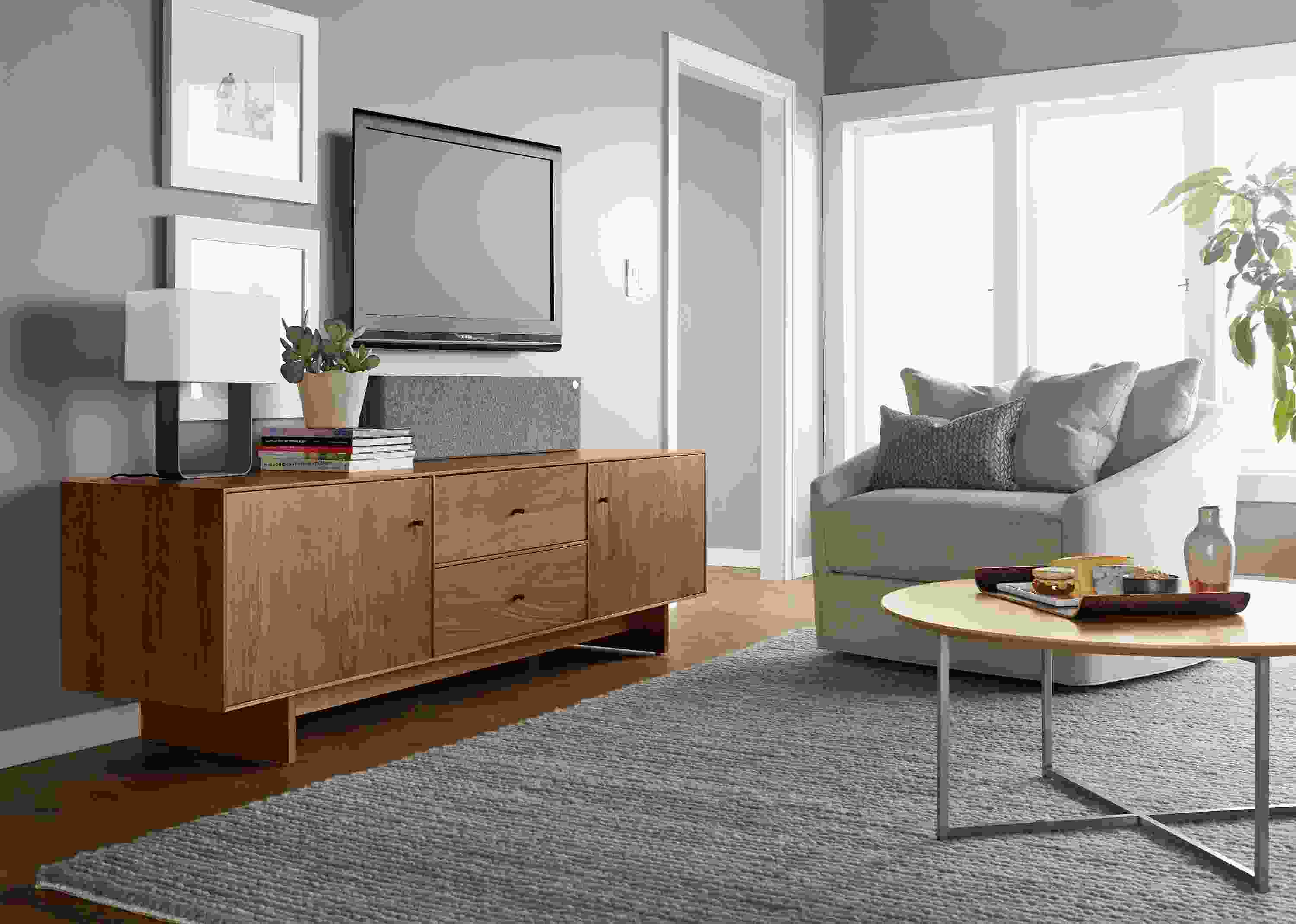 Left side detail of Hudson wood media cabinet.