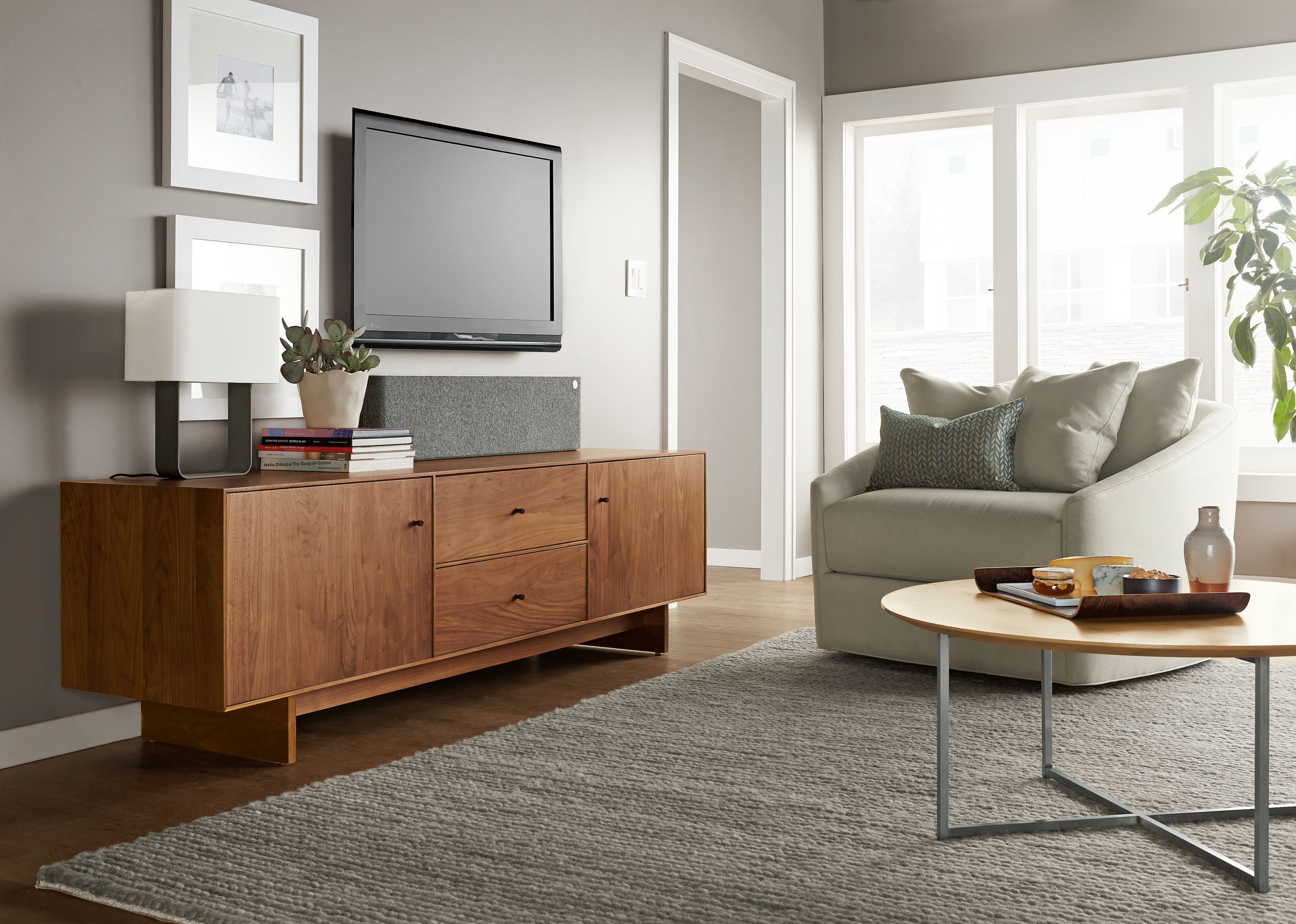 Left side detail of Hudson wood media cabinet.