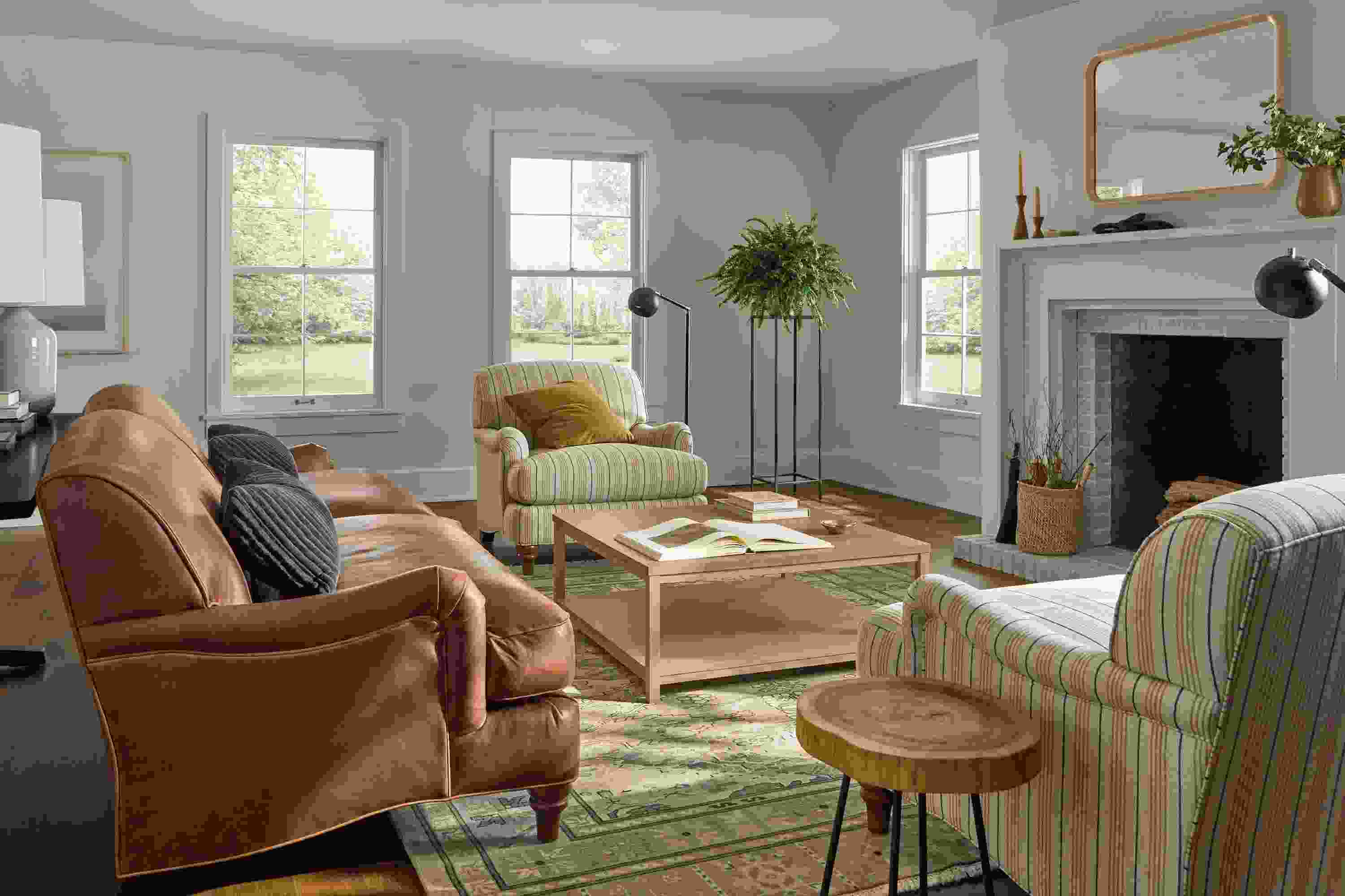 Large living room with Humphrey sofa in Sarto Cognac leather and 2 Humphrey chairs in Prescott Natural.