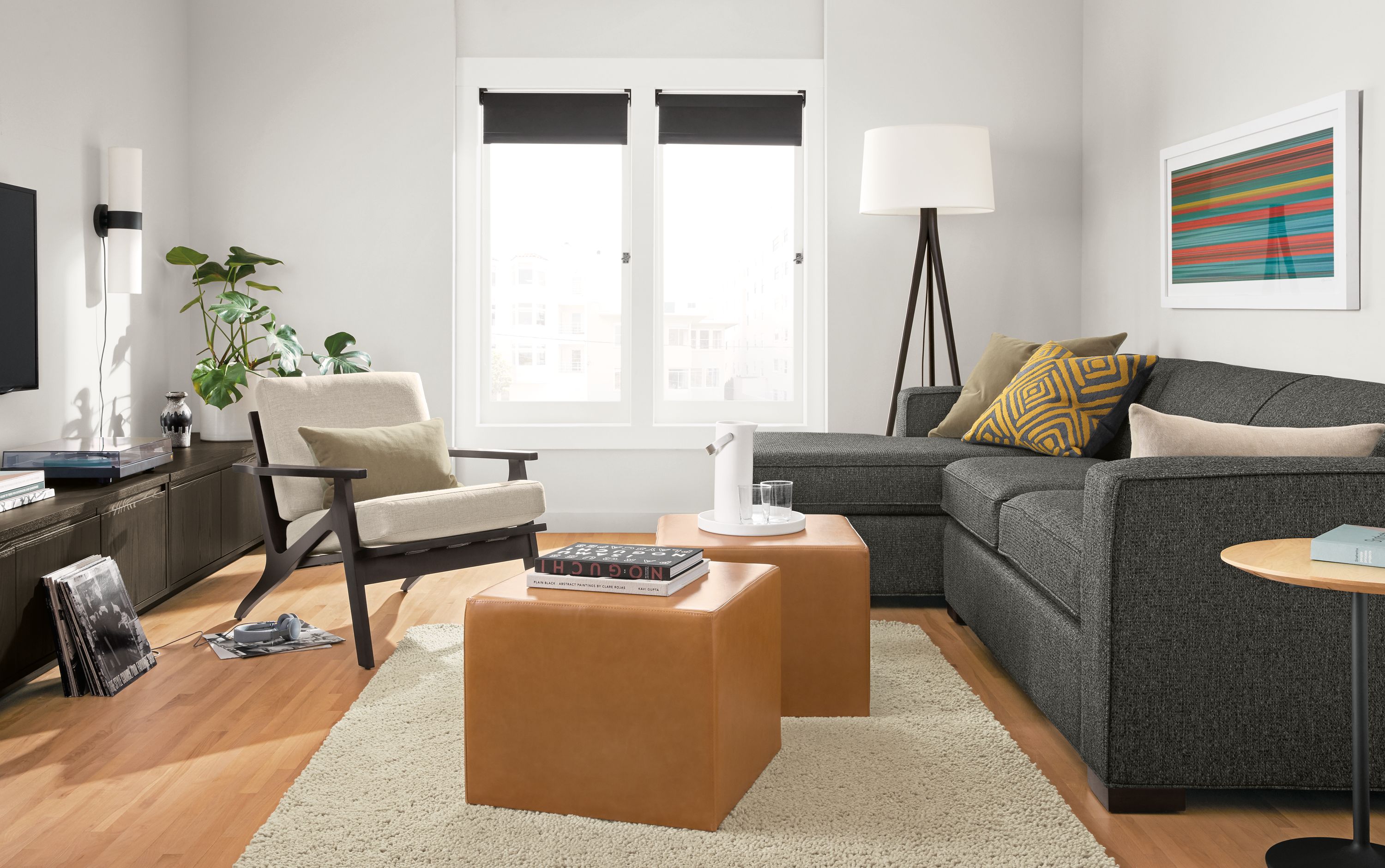 Living room with Ian sofa in Orla Grey, Sanna chair in Gino Oatmeal and Arden high-shag rug in oatmeal.