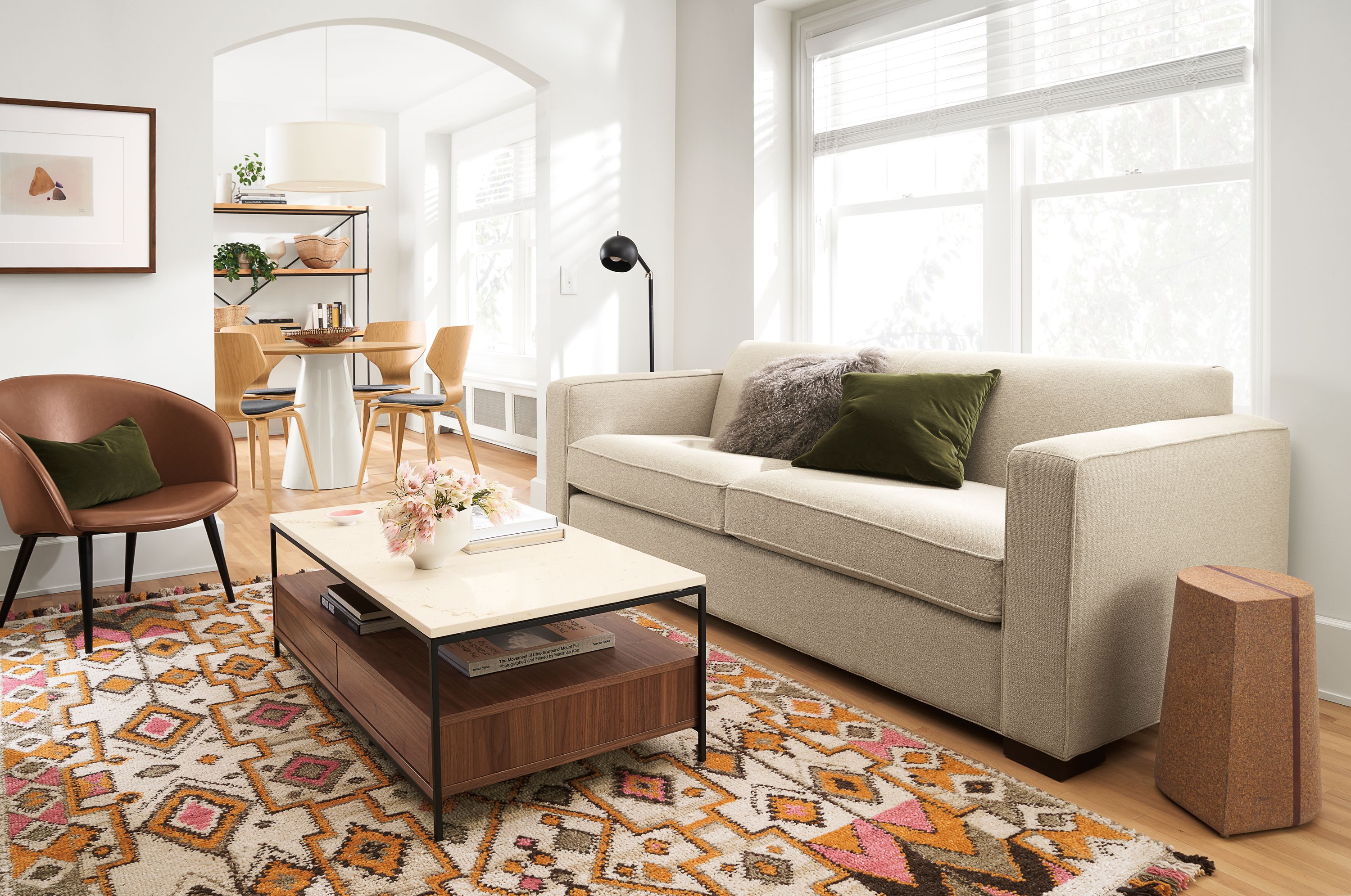 Living room with Ian sofa in Tatum Oatmeal and Williams coffee table in walnut with ecru quartz top.