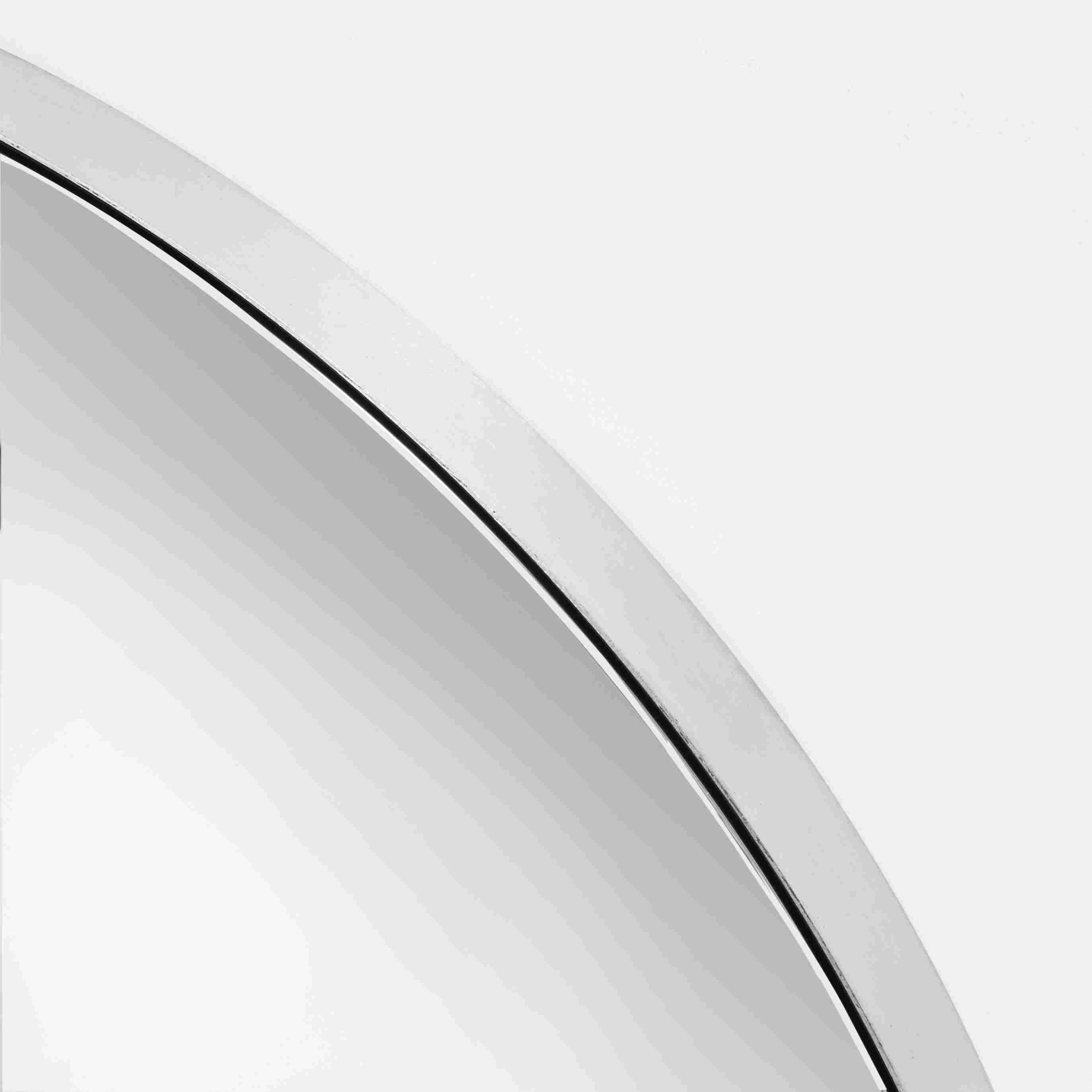 Detail of Infinity 36-round Mirror in Stainless Steel.