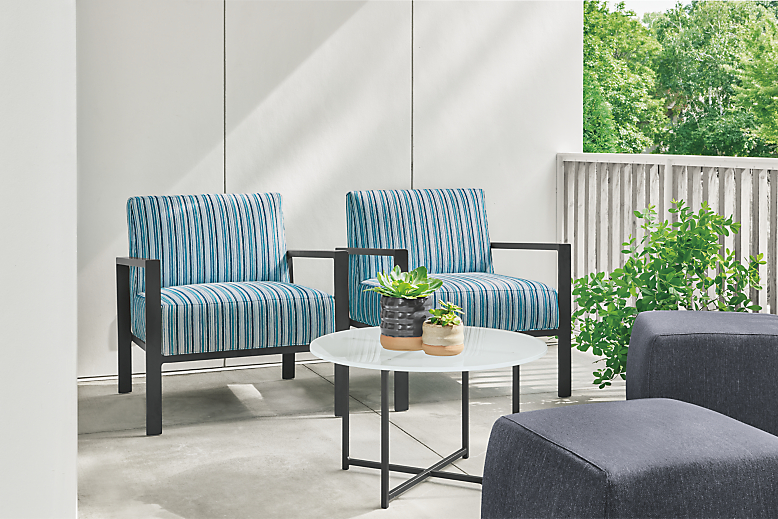Detail of Isles outdoor lounge chairs in Vinna ocean fabric.