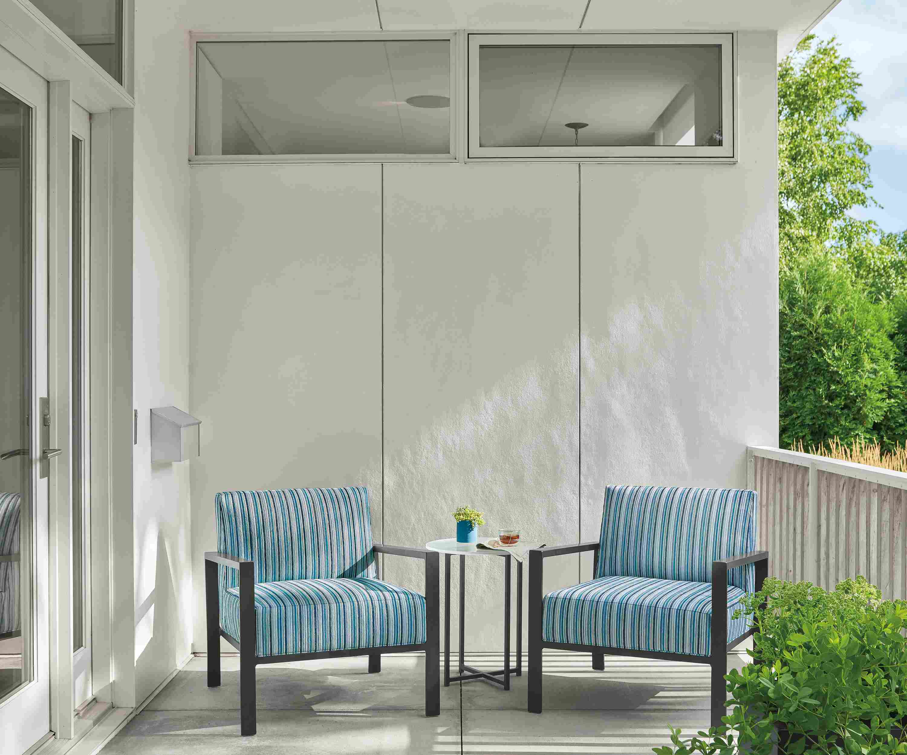 Detail of Isles outdoor lounge chairs in Vinna ocean fabric.