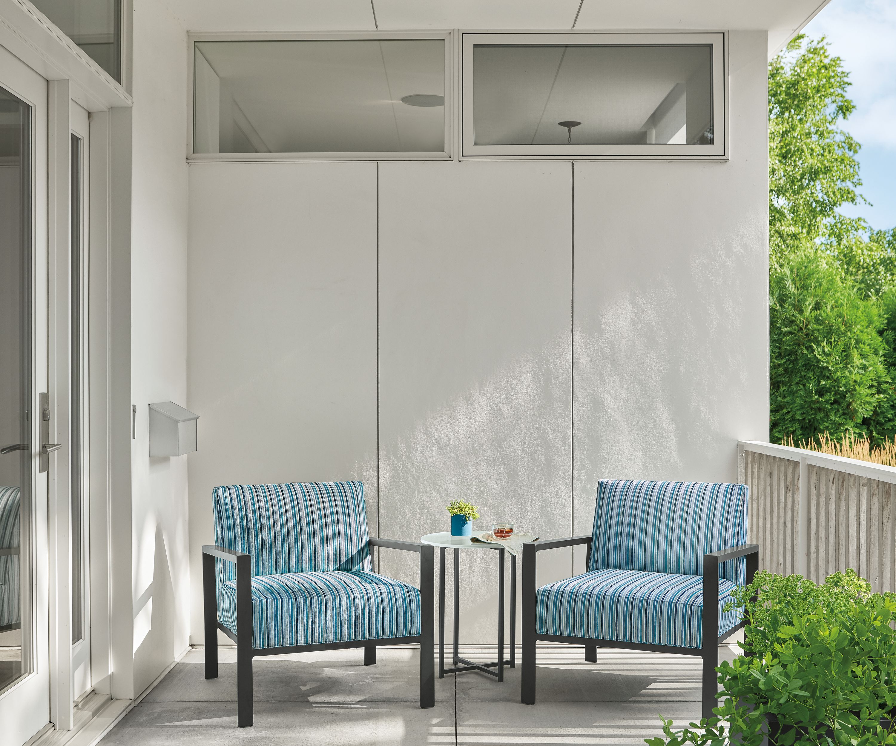 Detail of Isles outdoor lounge chairs in Vinna ocean fabric.