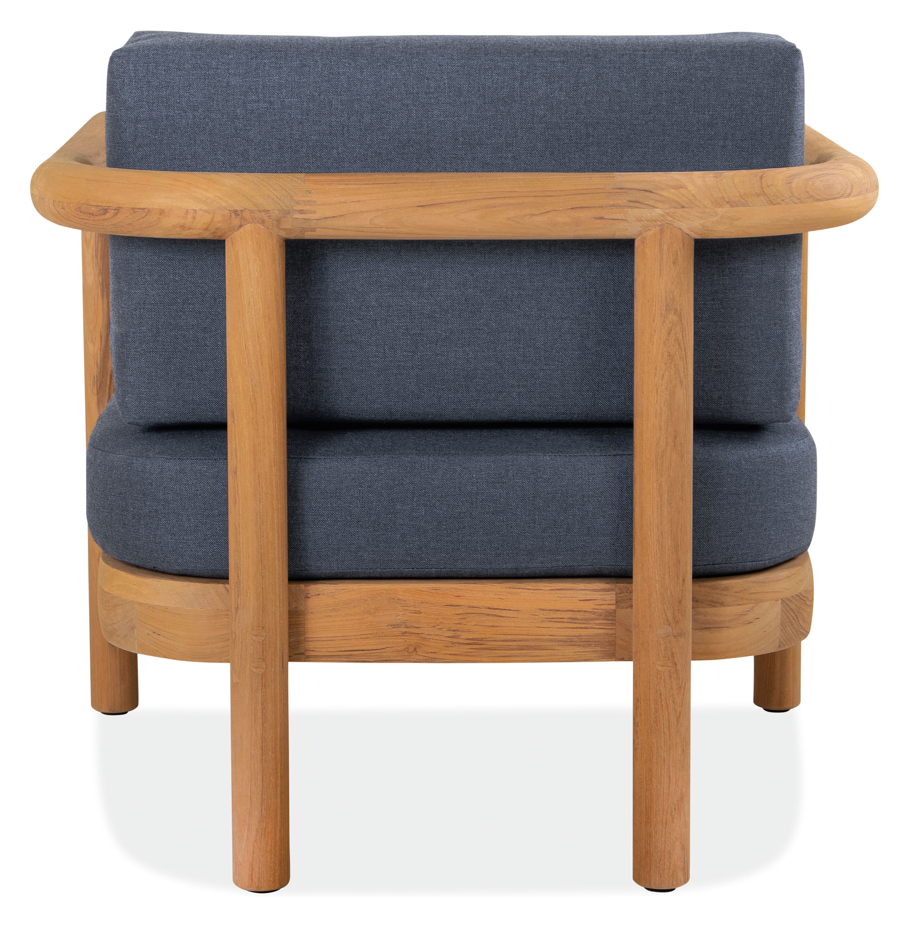 Back view of Isley Lounge Chair in Teak with Cushions in Bolton Navy.