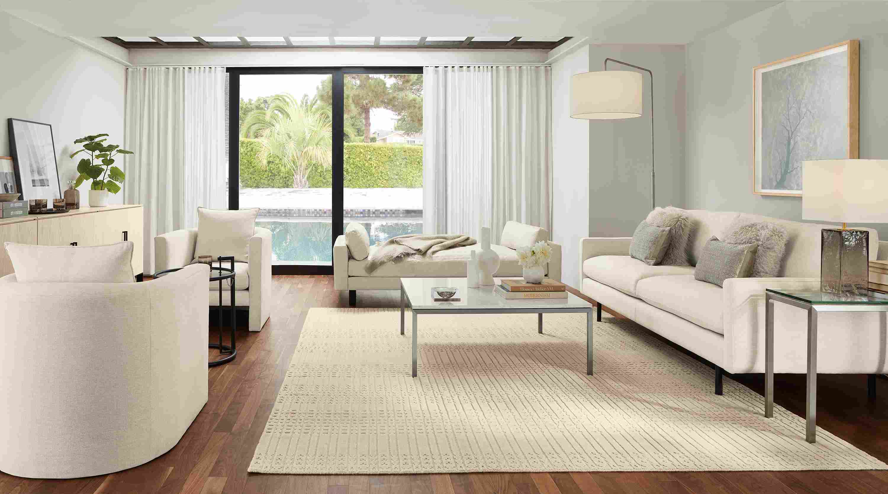 Living room with Jasper sofain Sumner Ivory, Pierson daybed in Vento Ivory and Bria rug in ivory.