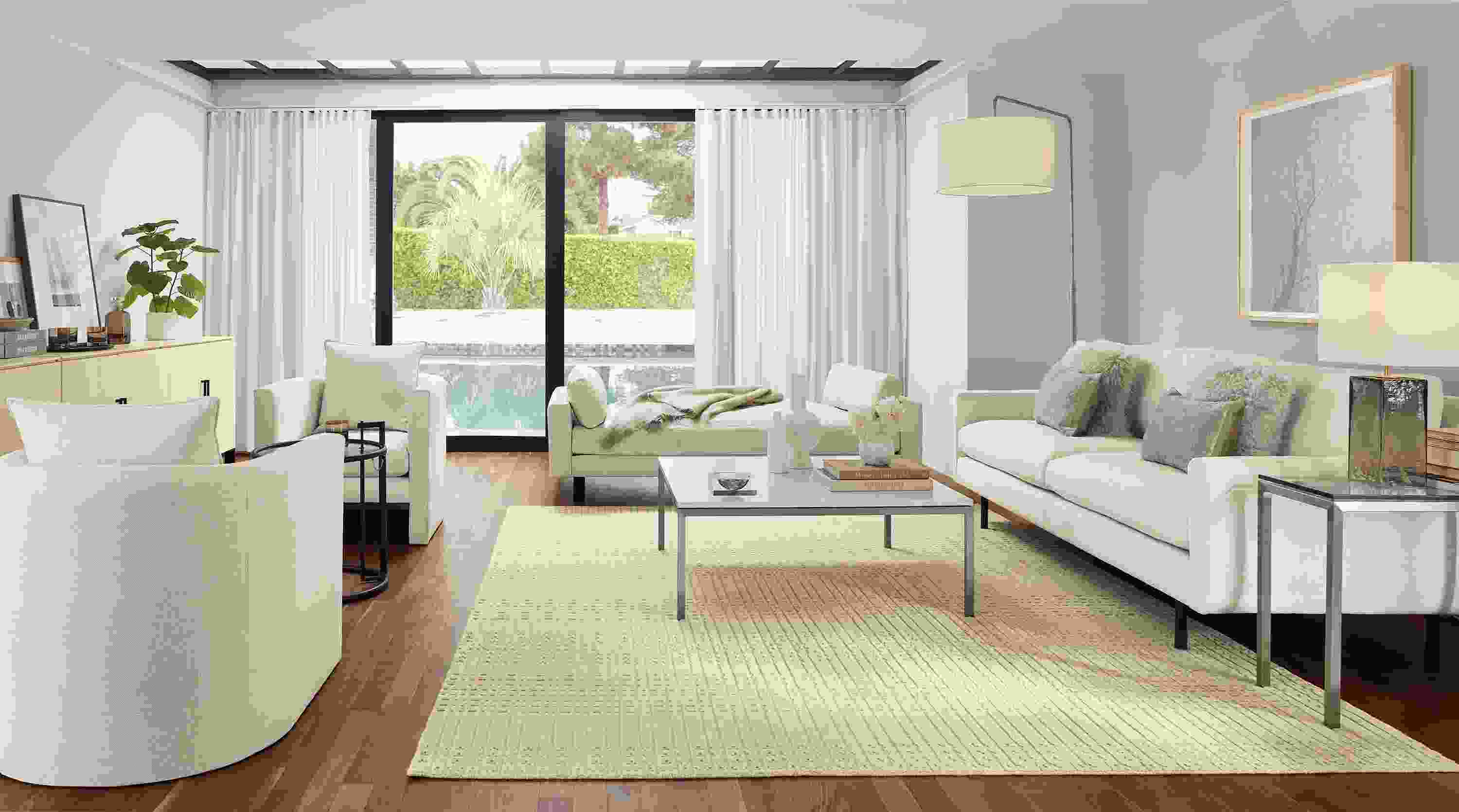 Living room with Jasper sofain Sumner Ivory, Pierson daybed in Vento Ivory and Bria rug in ivory.