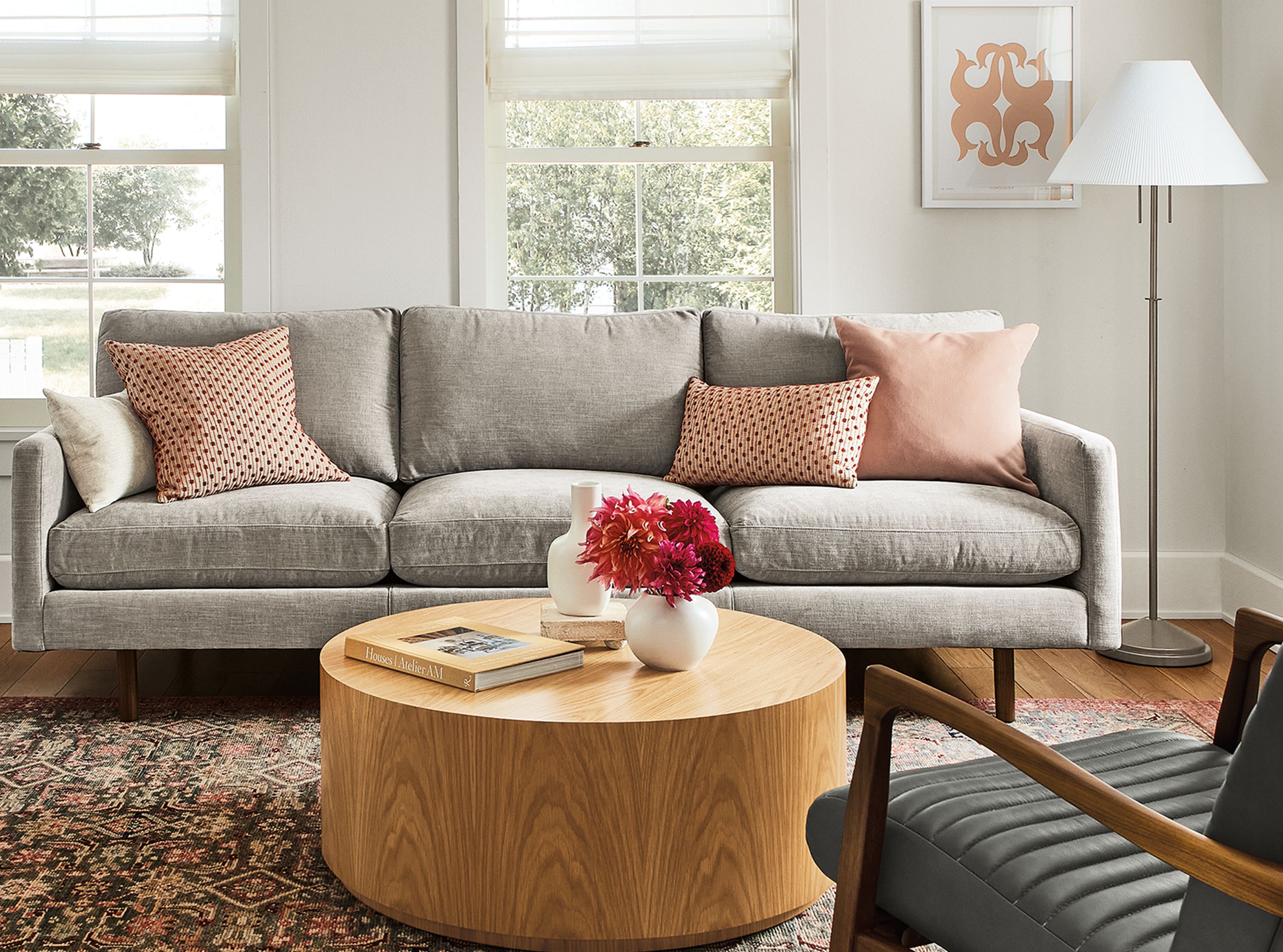 Living room with Jasper sofa in Mori Cement, Ravella bench in Windsor Otter and Liam coffee table in white oak.