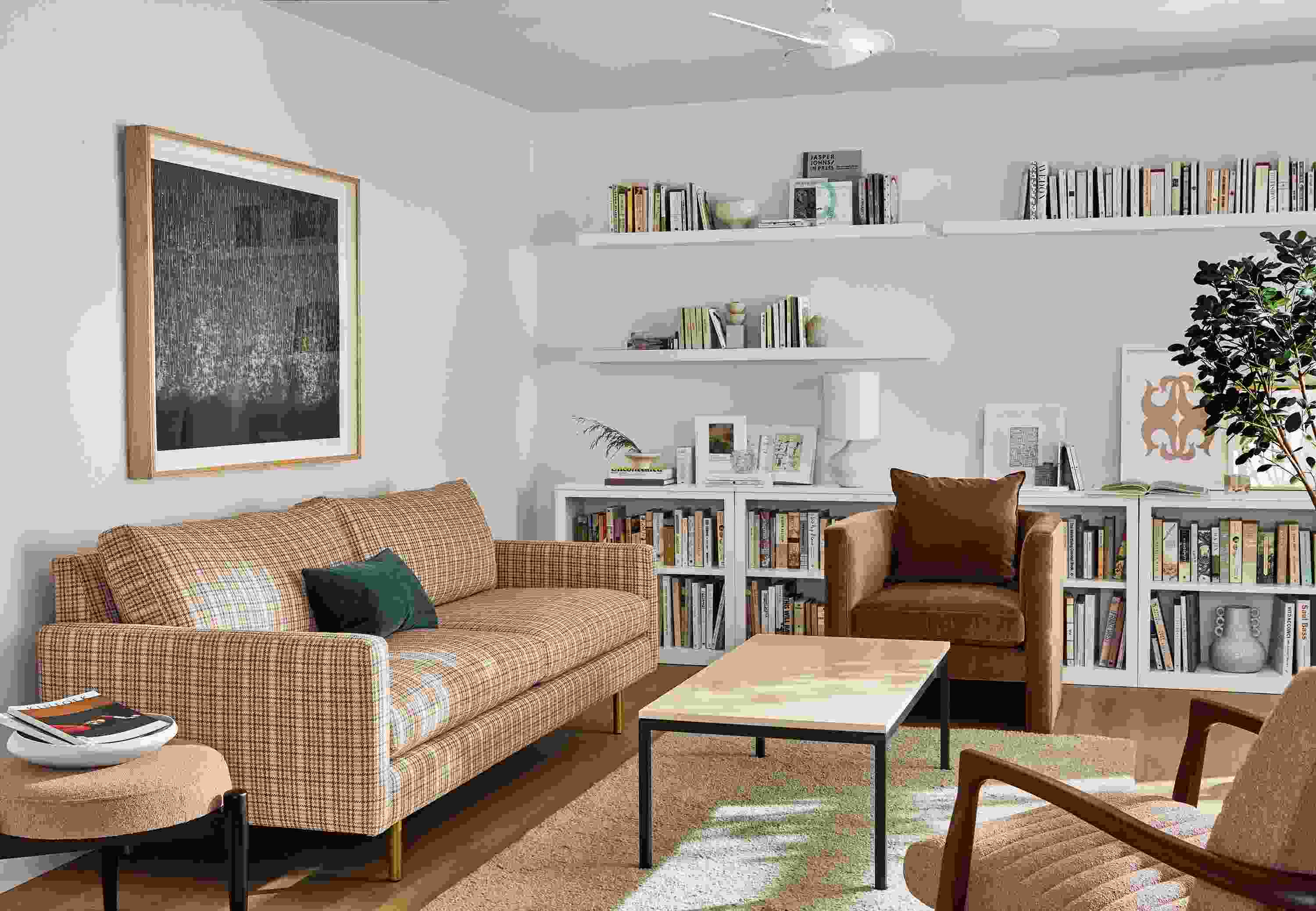 Living room with Jasper sofa in Medford Desert and Silva chair in Banks Cognac.