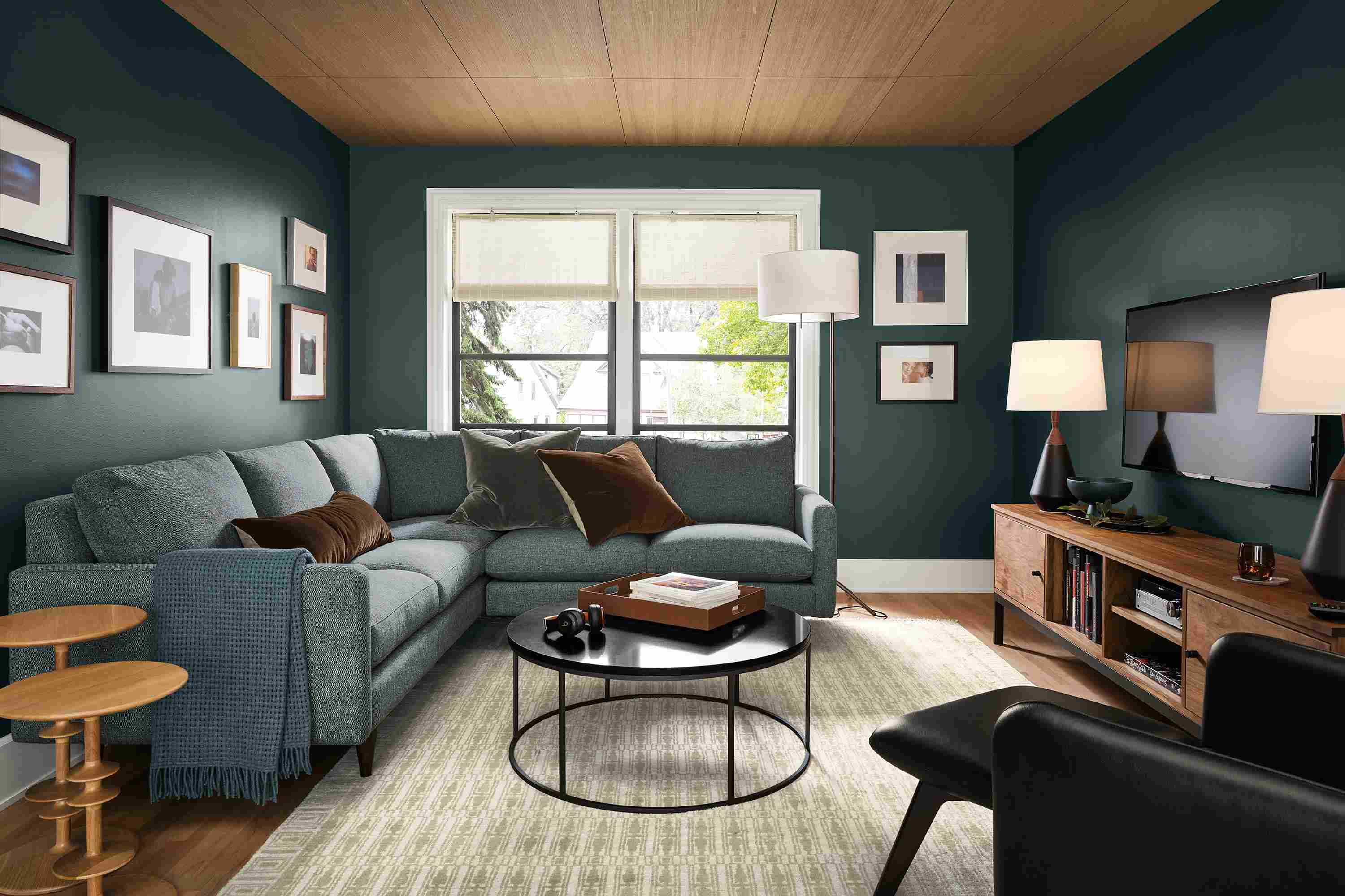 Living room with Jasper 2-piece left arm corner sofa in Tepic Haze and Hilliard chair in Lecco Black leather.