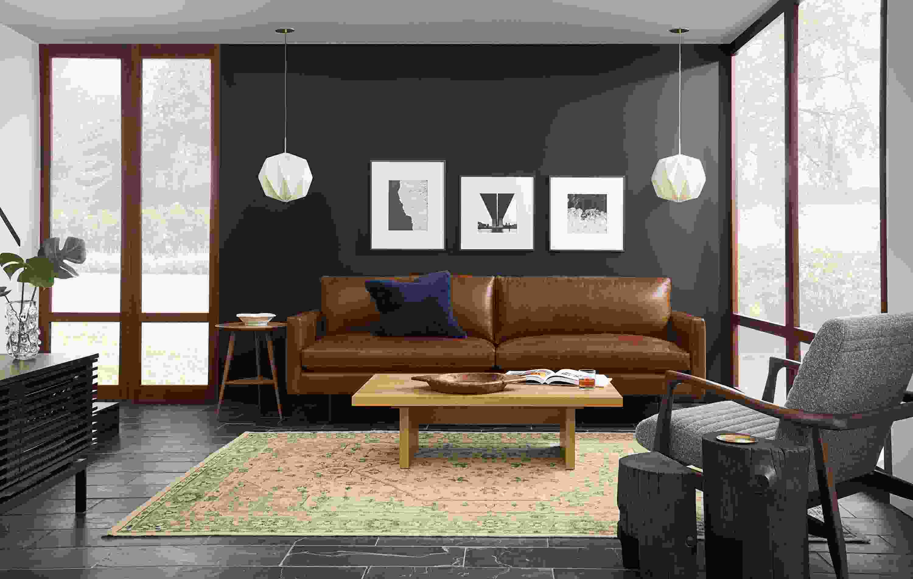 Living room with Jasper 86-wide sofa in Vento Cognac leather, Callan chair in Conley Graphite.