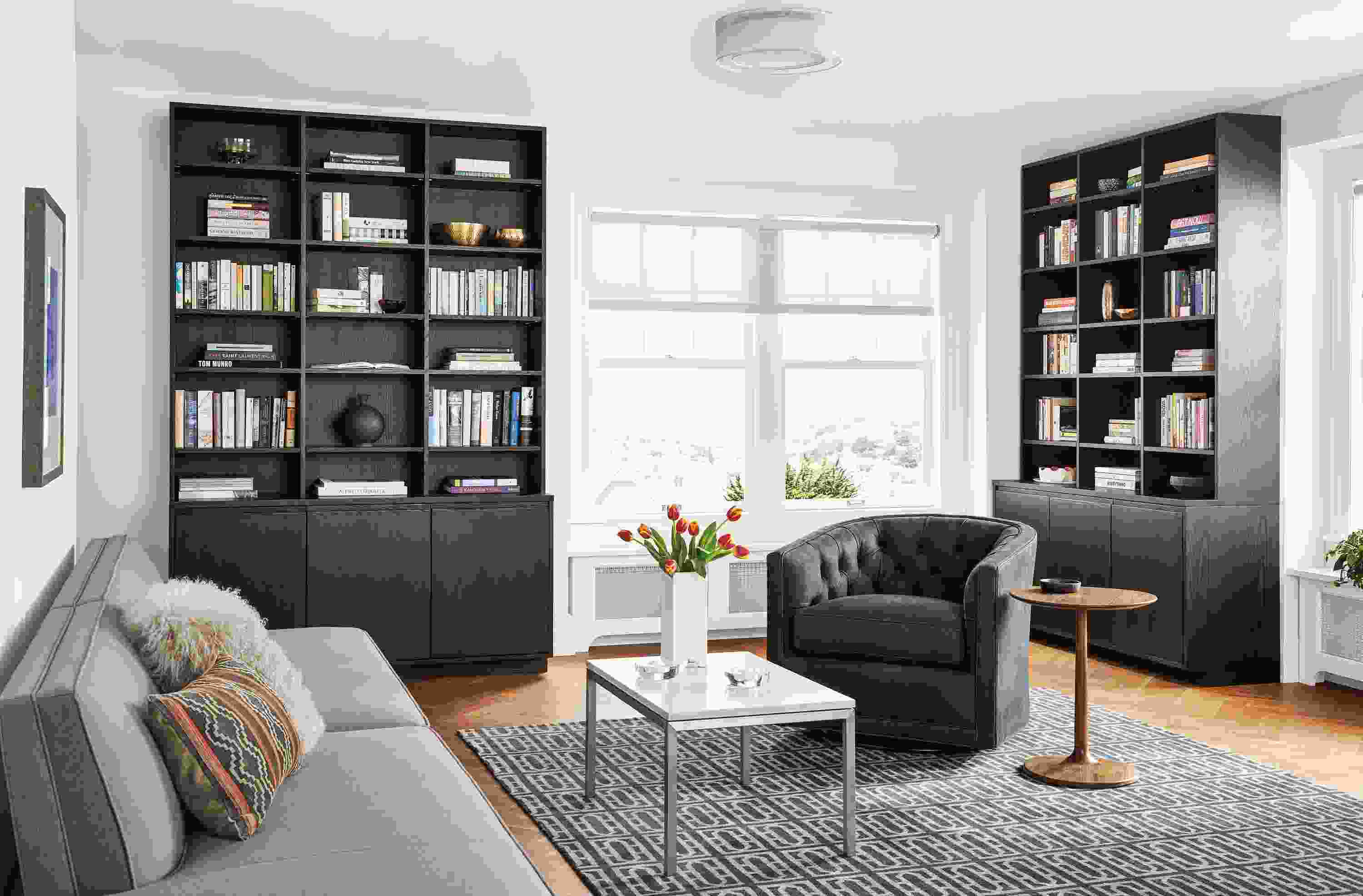 Detail of Keaton custom bookcases with doors.