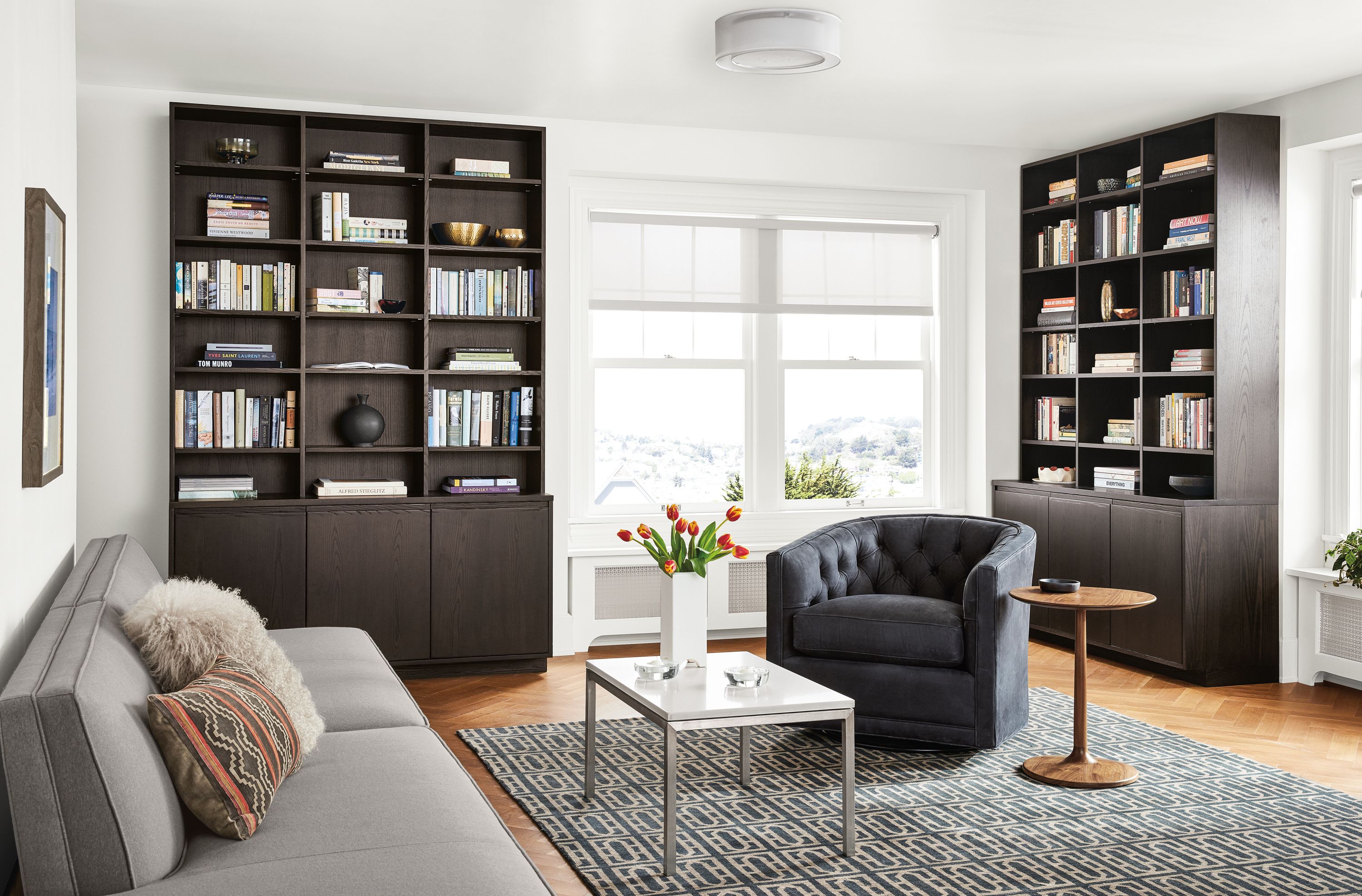 Detail of Keaton custom bookcases with doors.