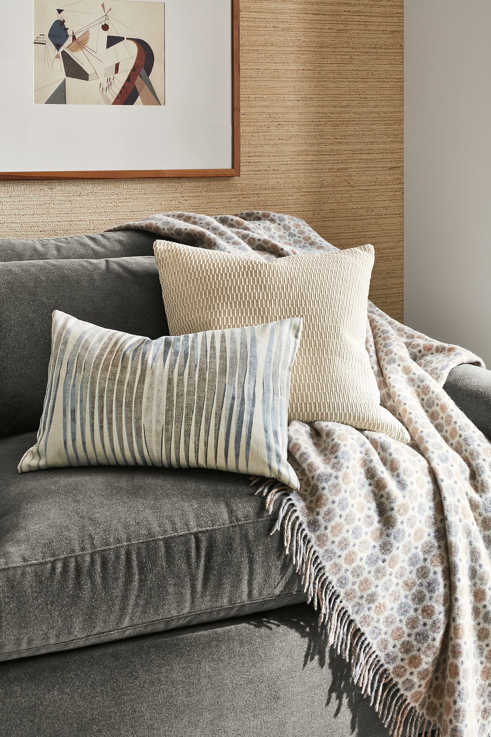 detail of kelvin throw pillow and montreal throw pillow on sofa.