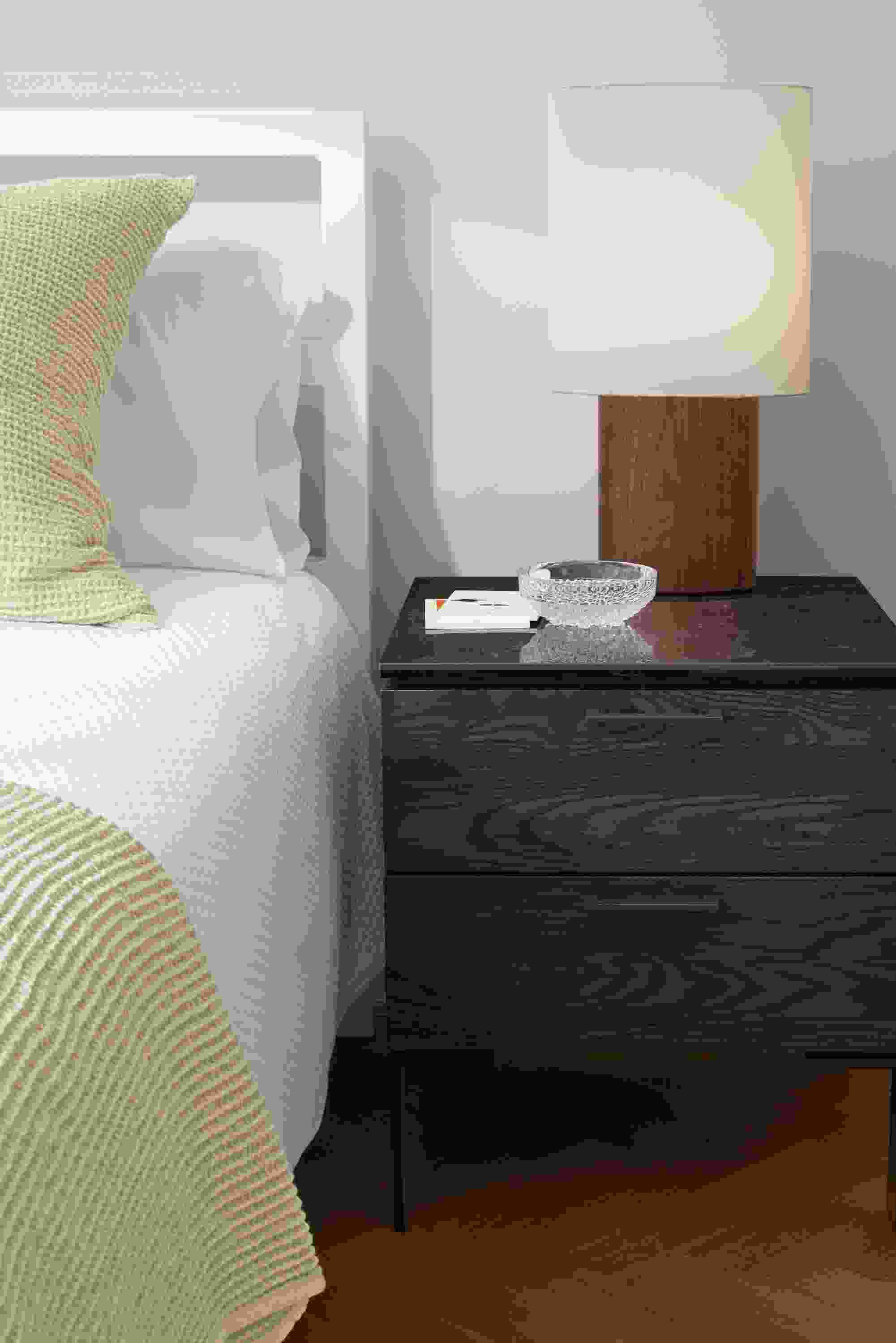 detail of kenwood two-drawer nightstand in charcoal in bedroom.