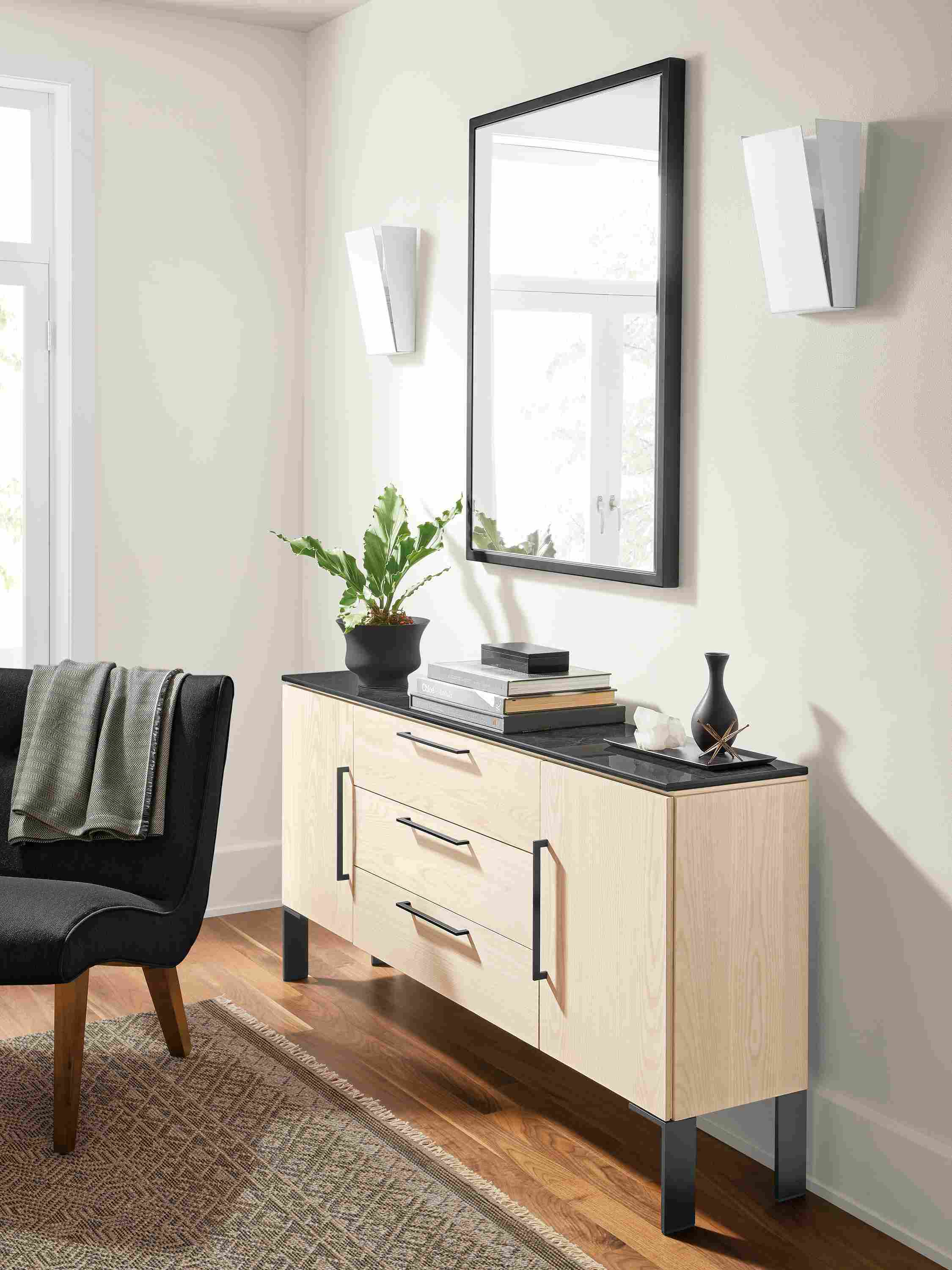 Detail of Kenwood storage cabinet in sand on ash with ceramic top.