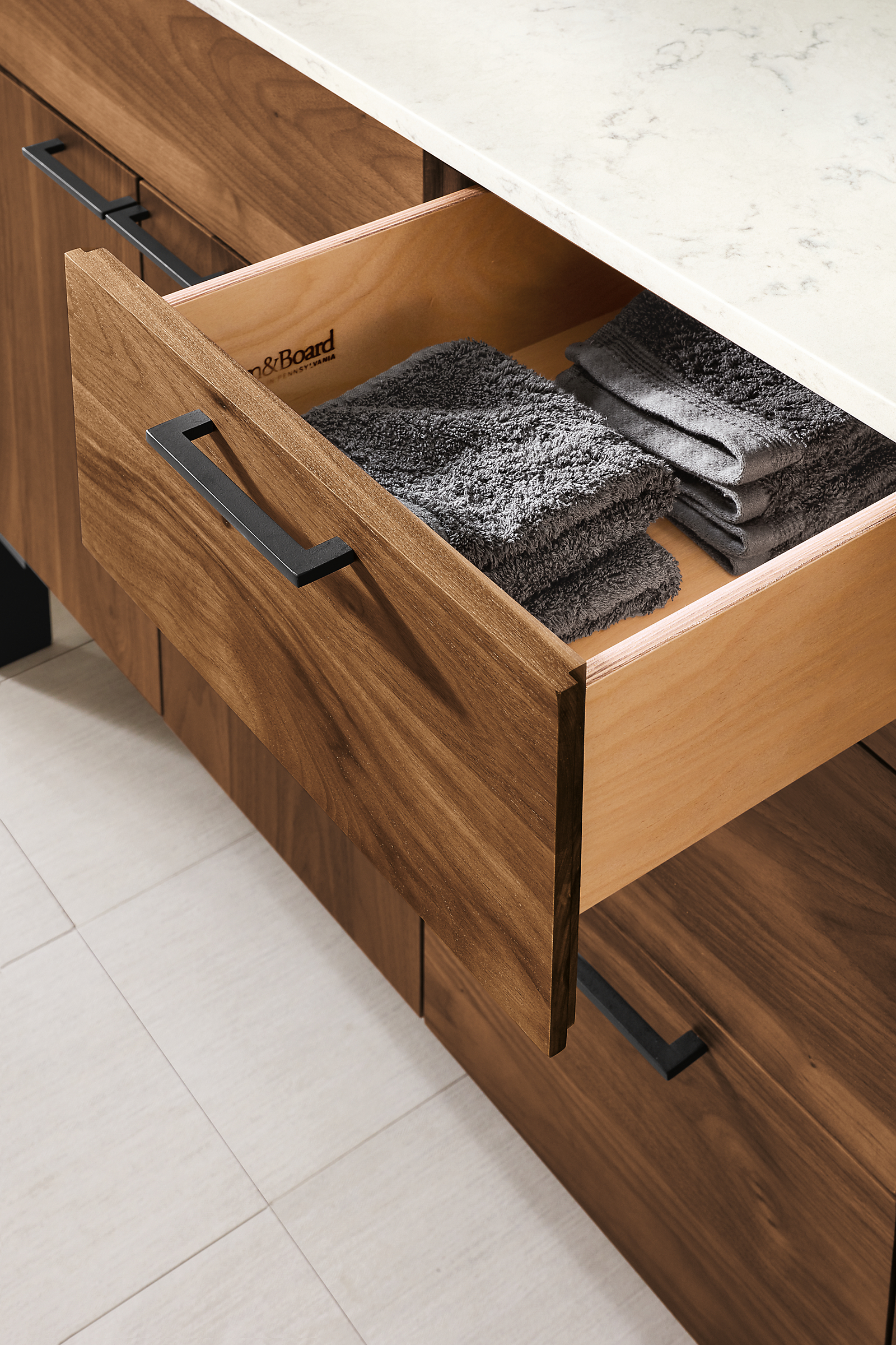 Detail of Kenwood vanity with open drawer.