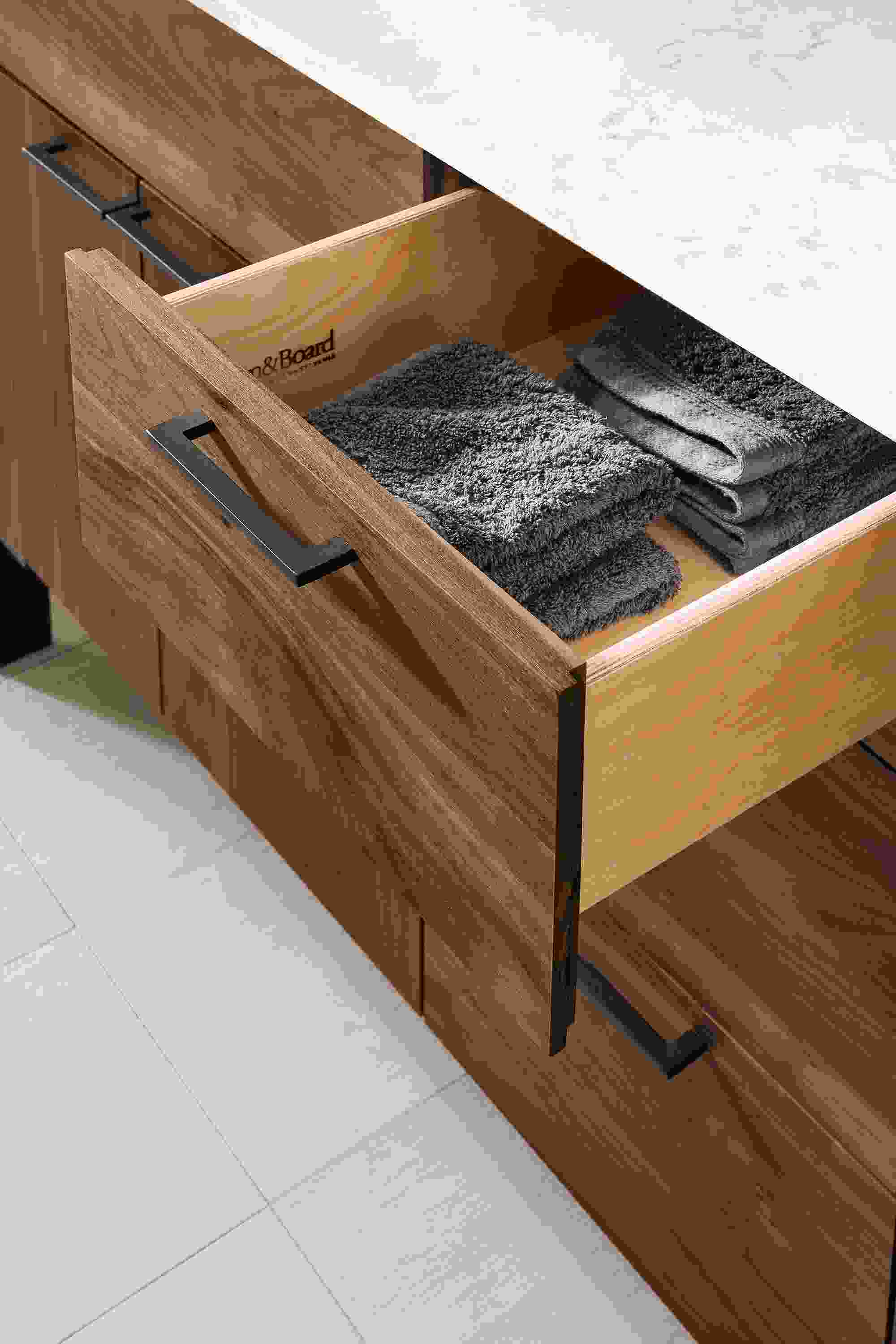 Detail of Kenwood vanity with open drawer.