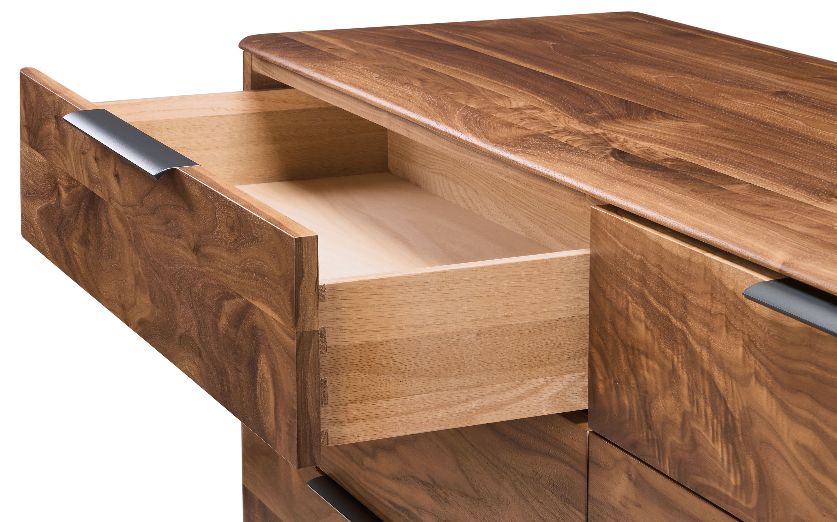 Detail shot of an open drawer on a Kingston 70-wide 6-drawer dresser in walnut.