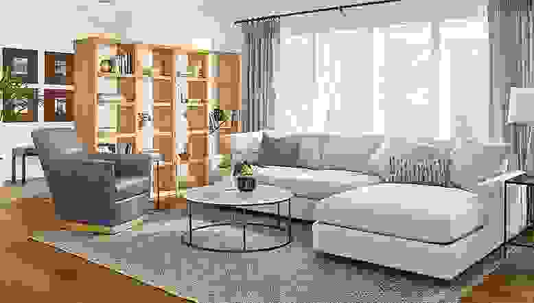 Detail of living room with Lennox bookcases, Markus chair and Linger sofa with chaise.