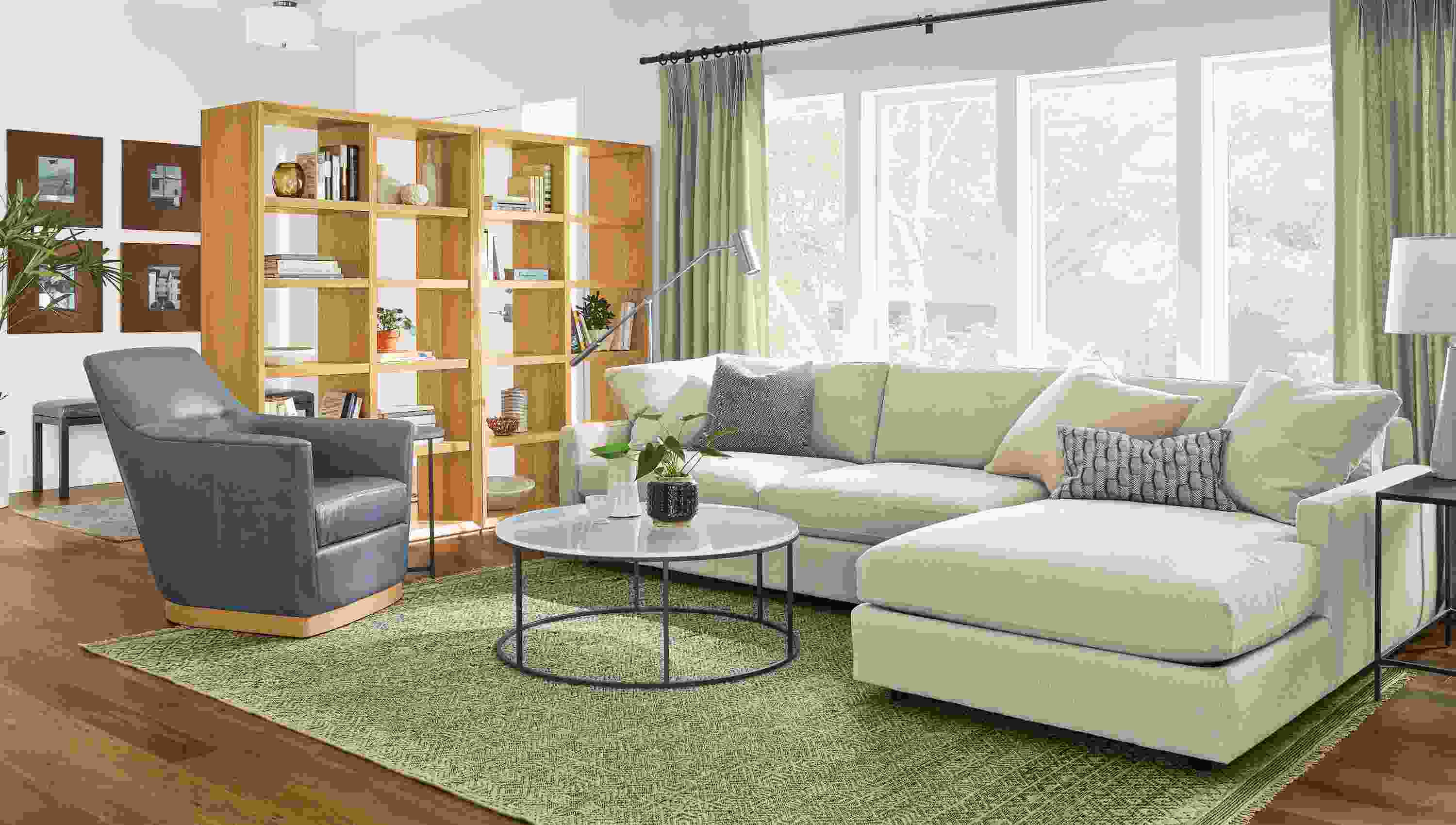 Detail of living room with Lennox bookcases, Markus chair and Linger sofa with chaise.
