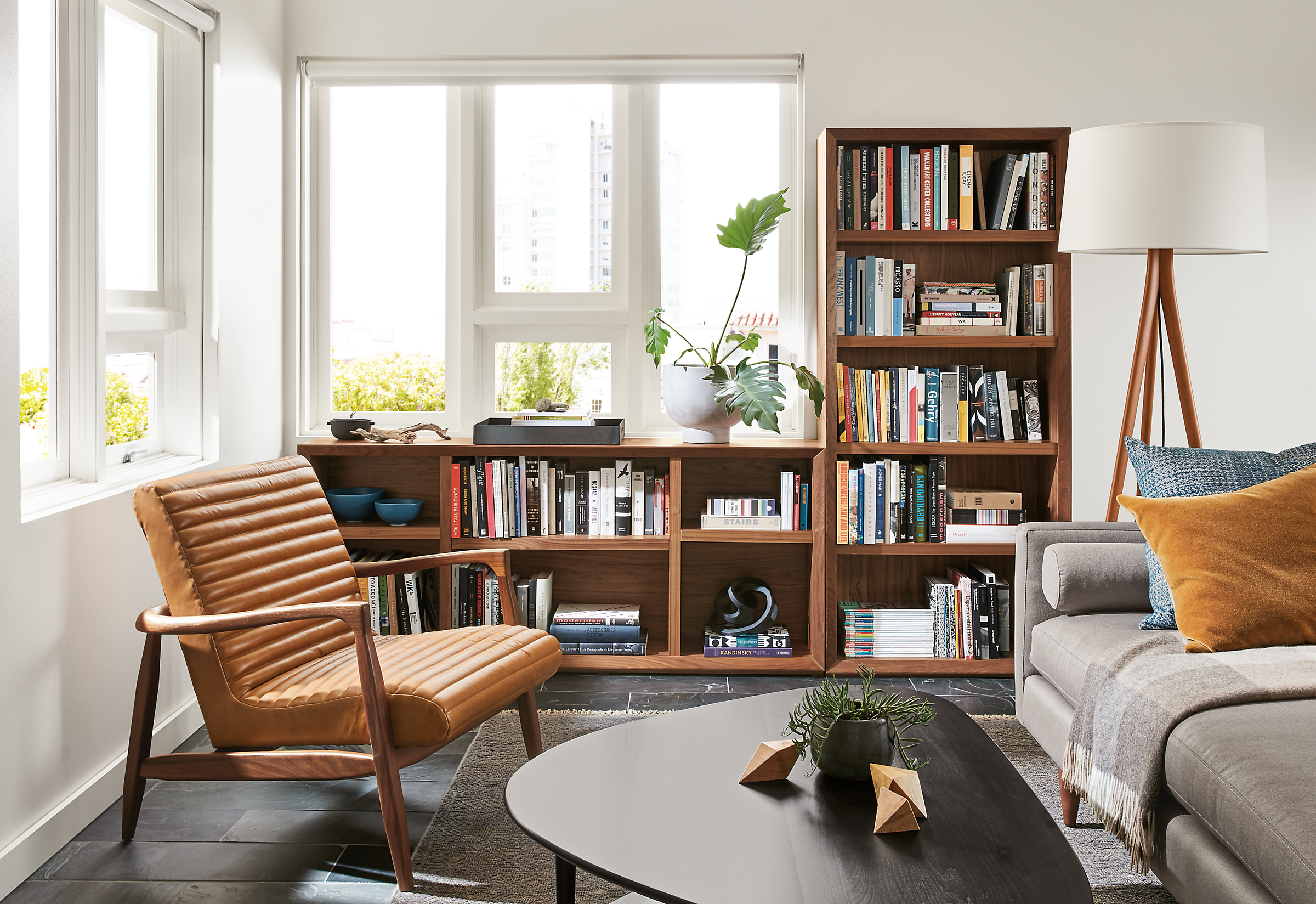 Detail of 2 Lennox bookcases in living room with Callan chair.
