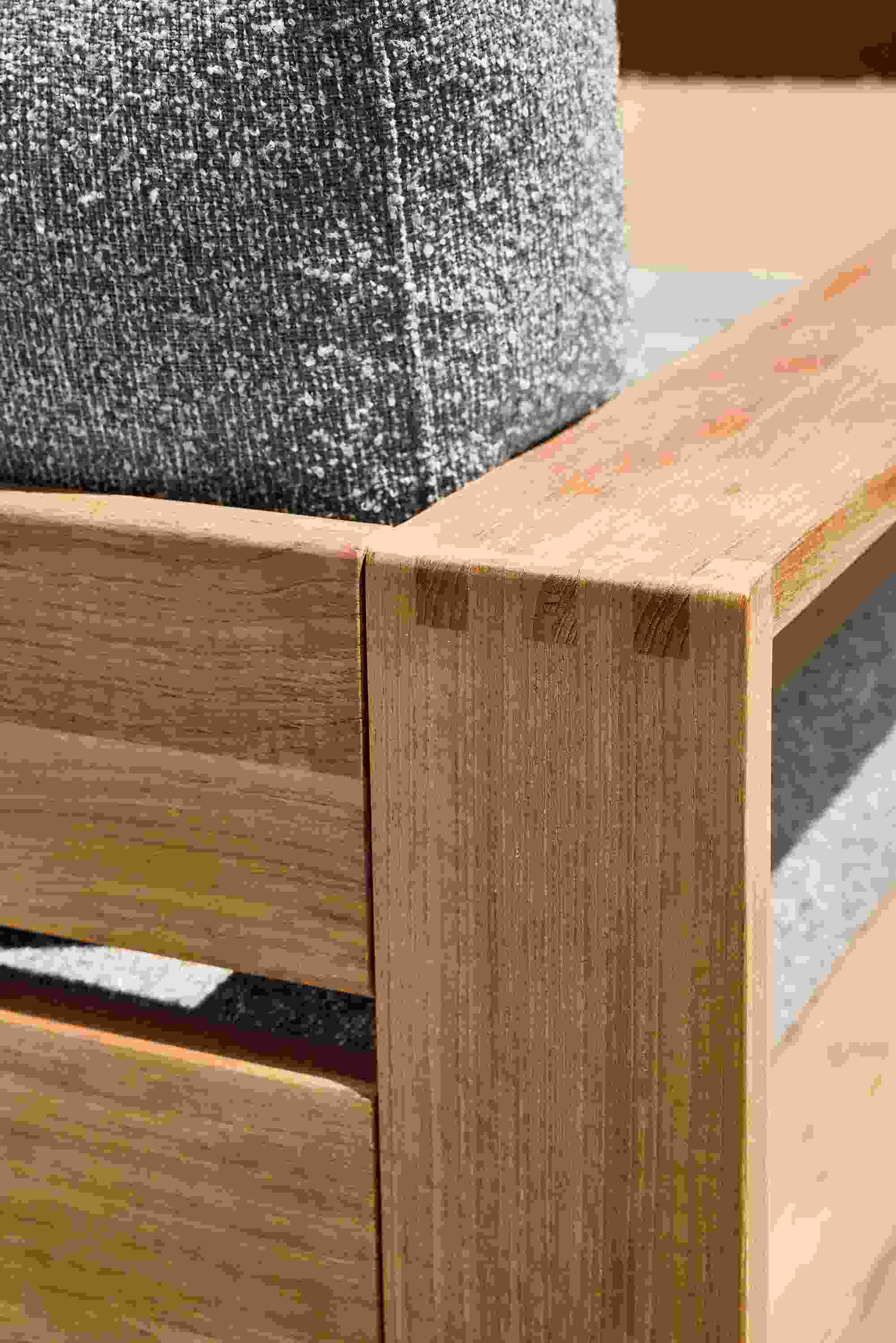 Detail of corner joinery on a Leti lounge chair in Teak Heartwood and Kloss Otter.