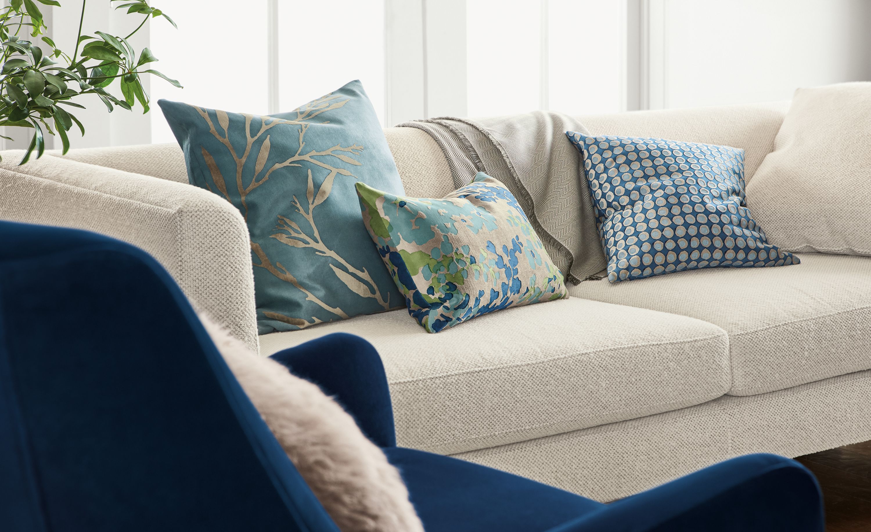 Detail of Liana outdoor pillow in blue.