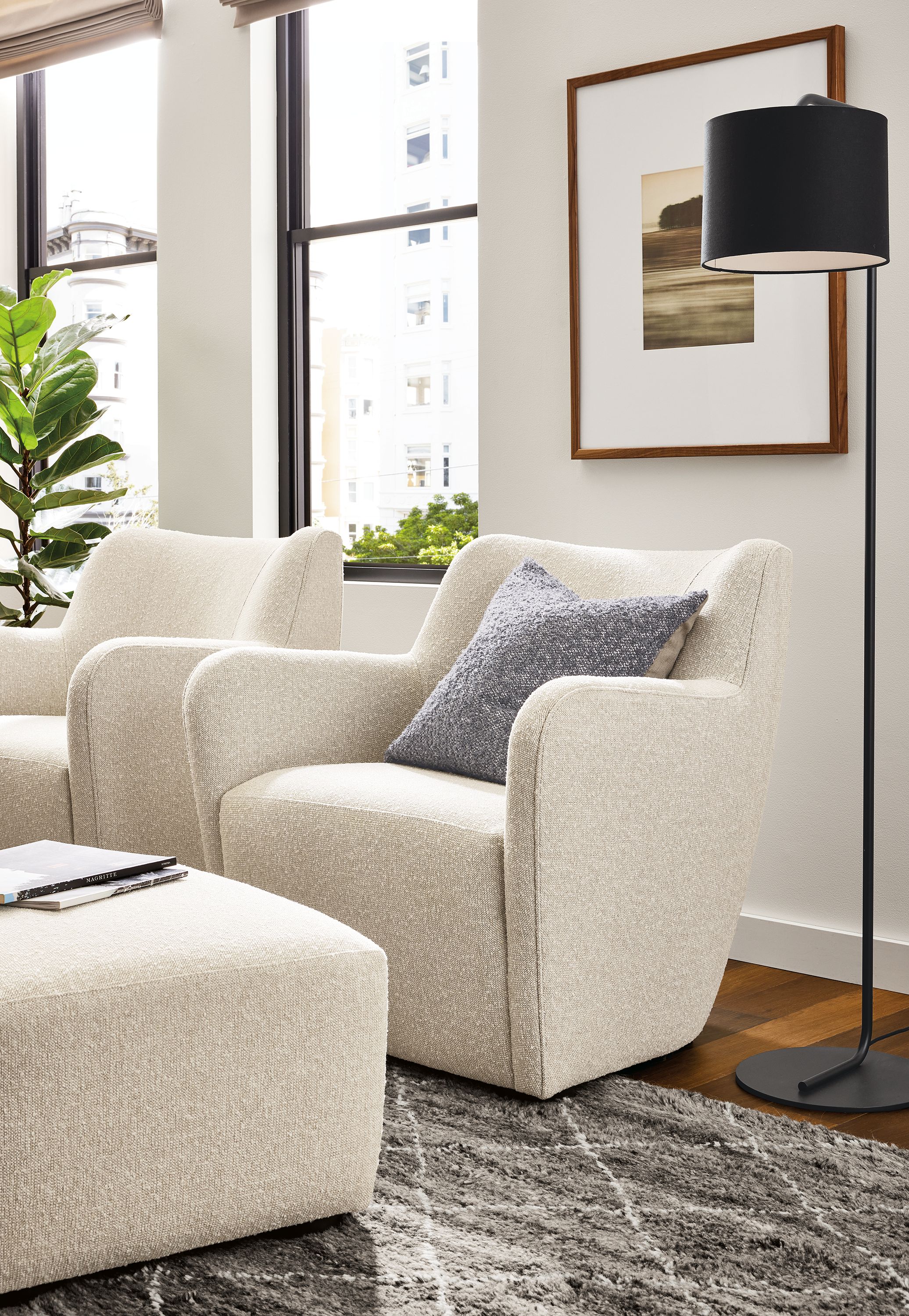 living room with lily chairs and ottoman in conley natural fabric.