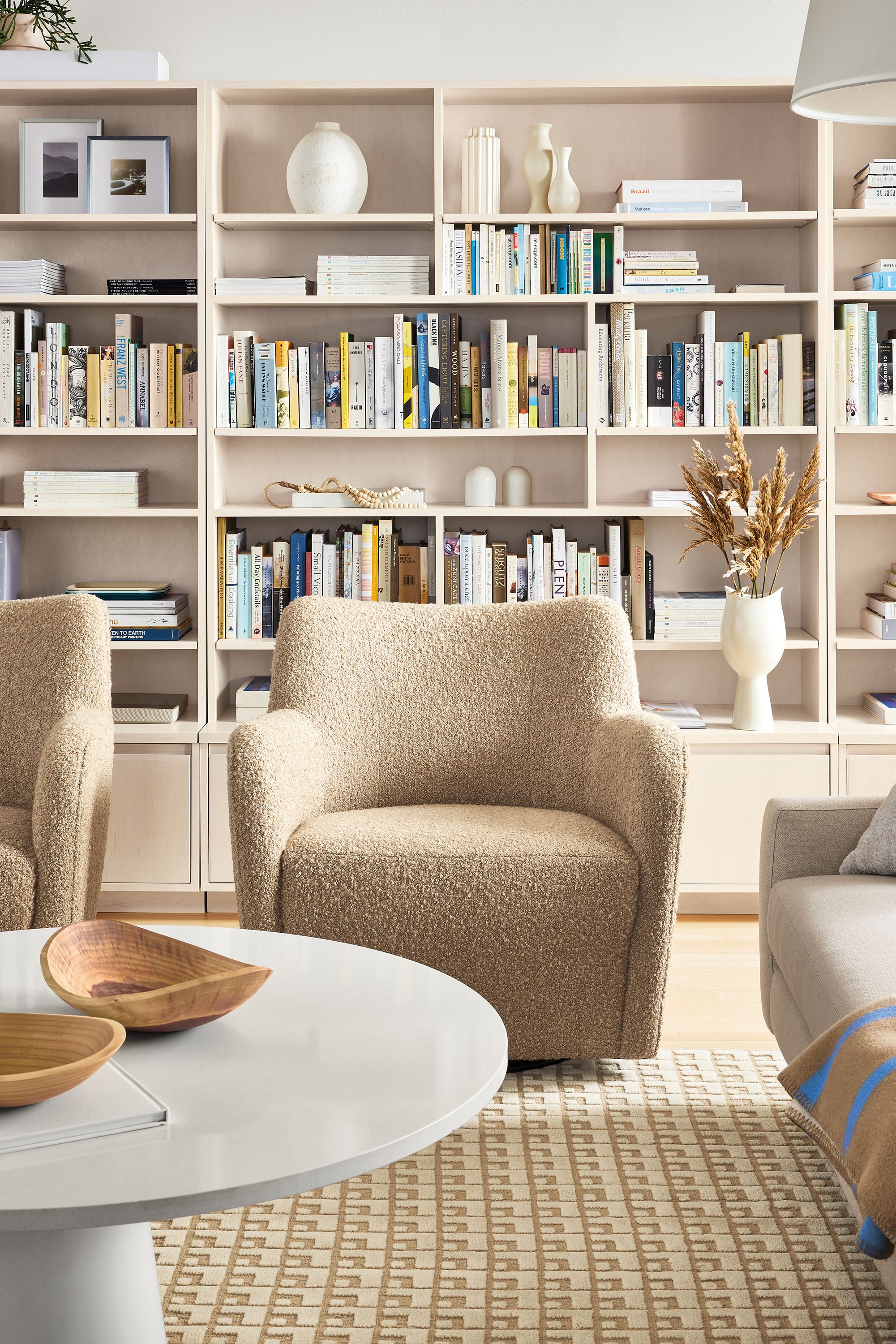 living room with two lily swivel chairs in dornick fabric.