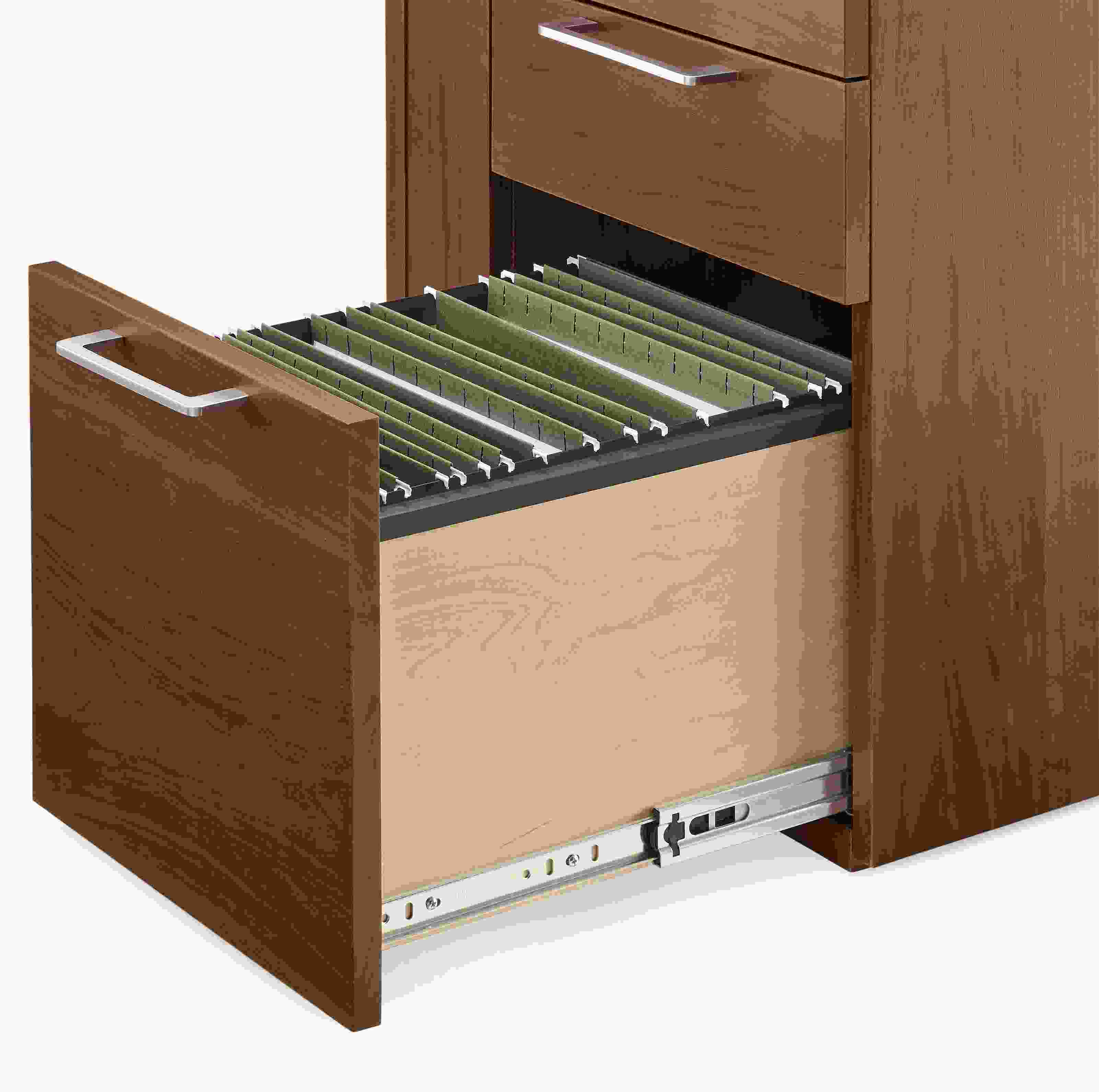 Detail of open drawer on a Lincoln 72-wide adjustable standing desk in walnut showing letter size file folders.