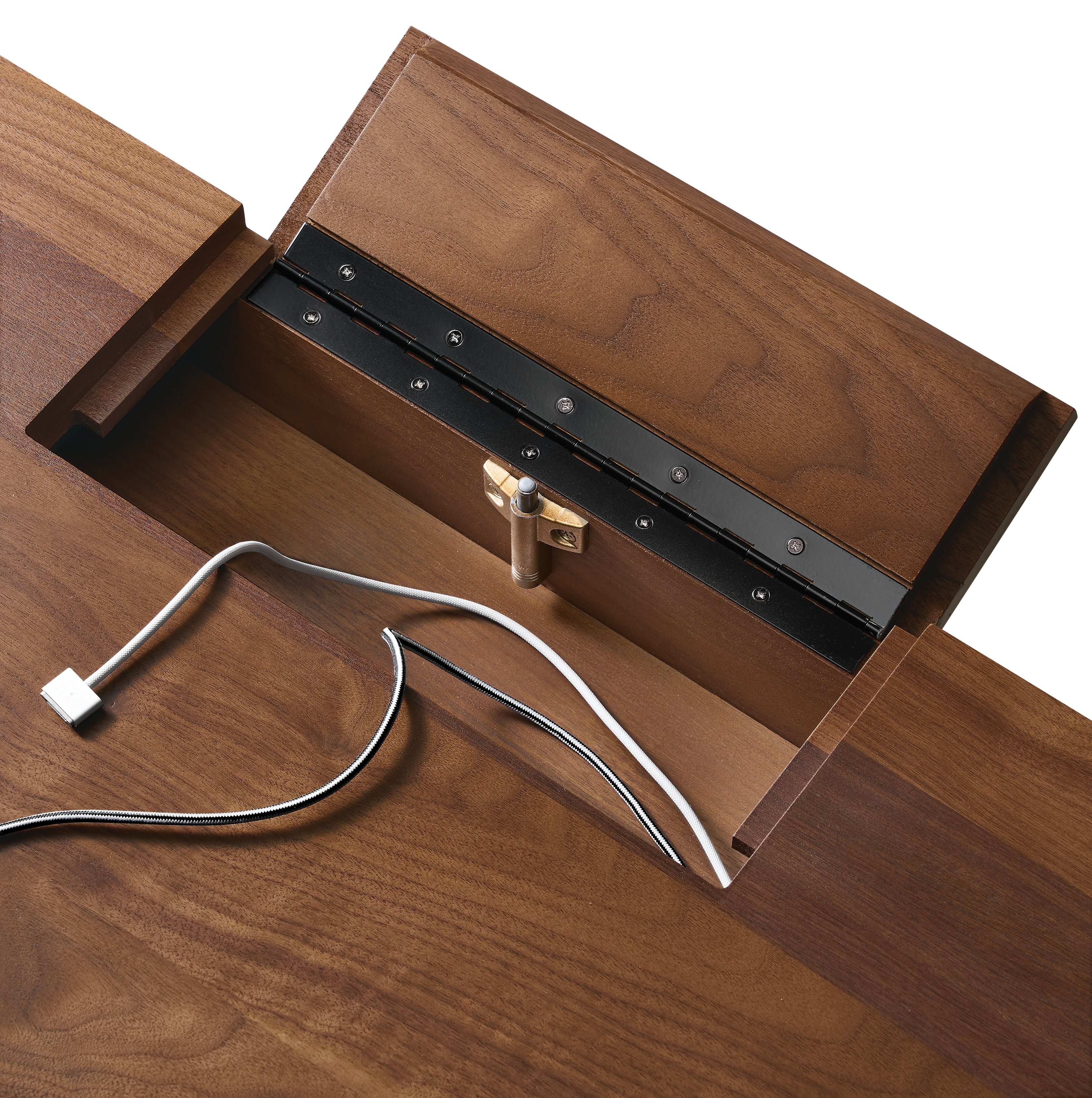 Detail of hinged cord access cover shown open on Lincoln 72-wide adjustable standing desk in walnut.