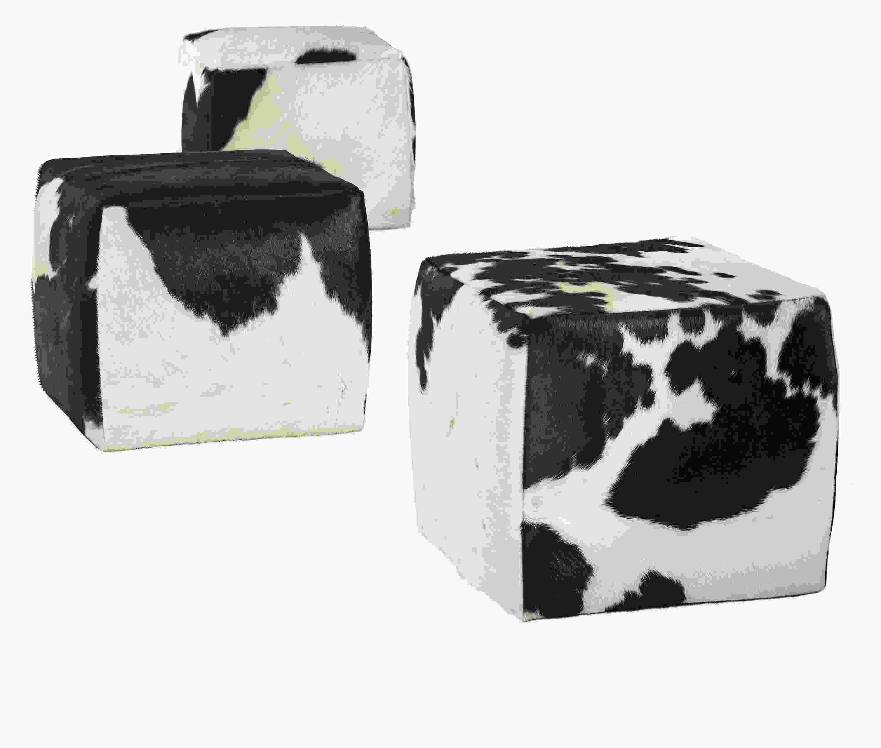 Angled view of Lind 21w 21d 18h Square Ottoman in Cowhide Black.