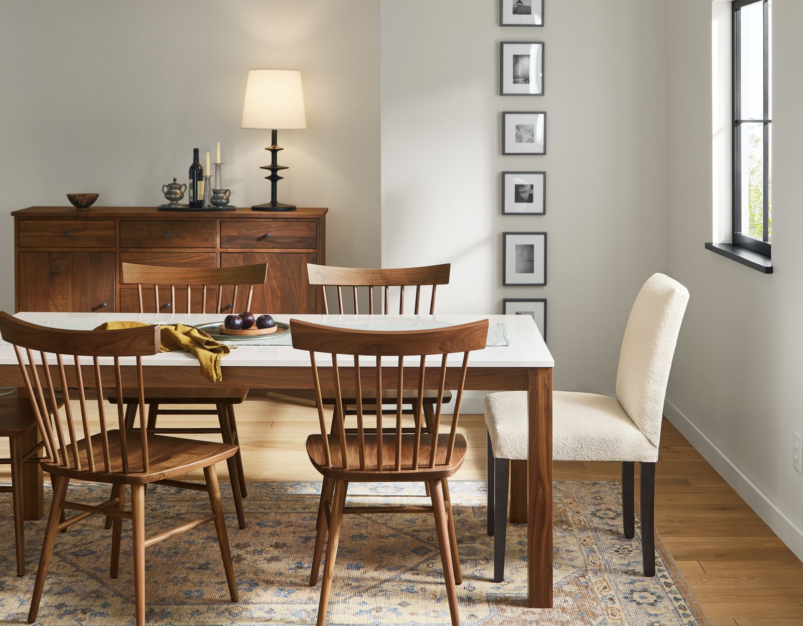dining room with linden table, four thatcher chairs and peyton chair.