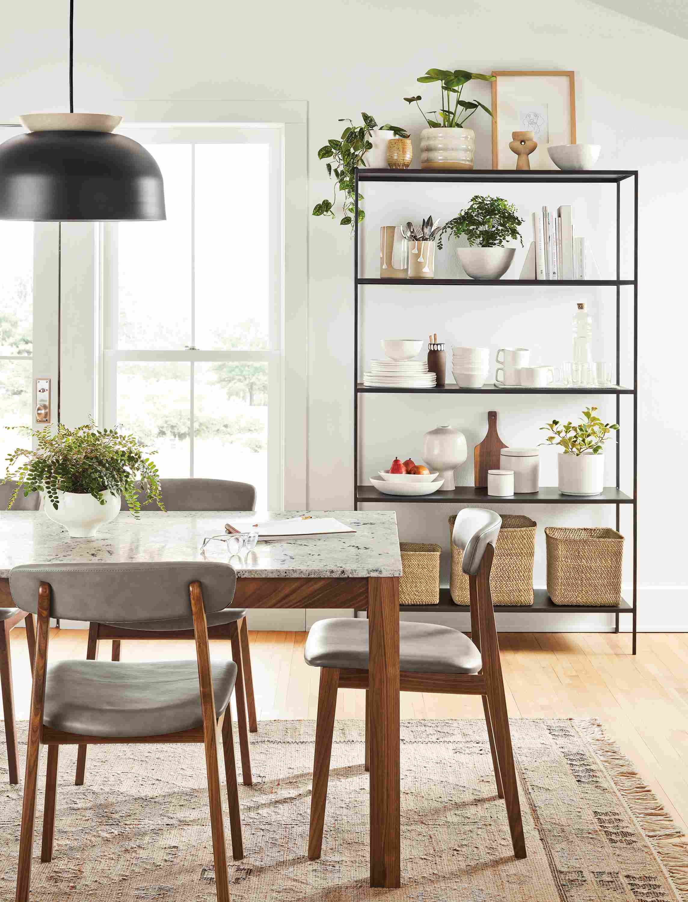 dining room with linden dining table with walnut base and quartz top