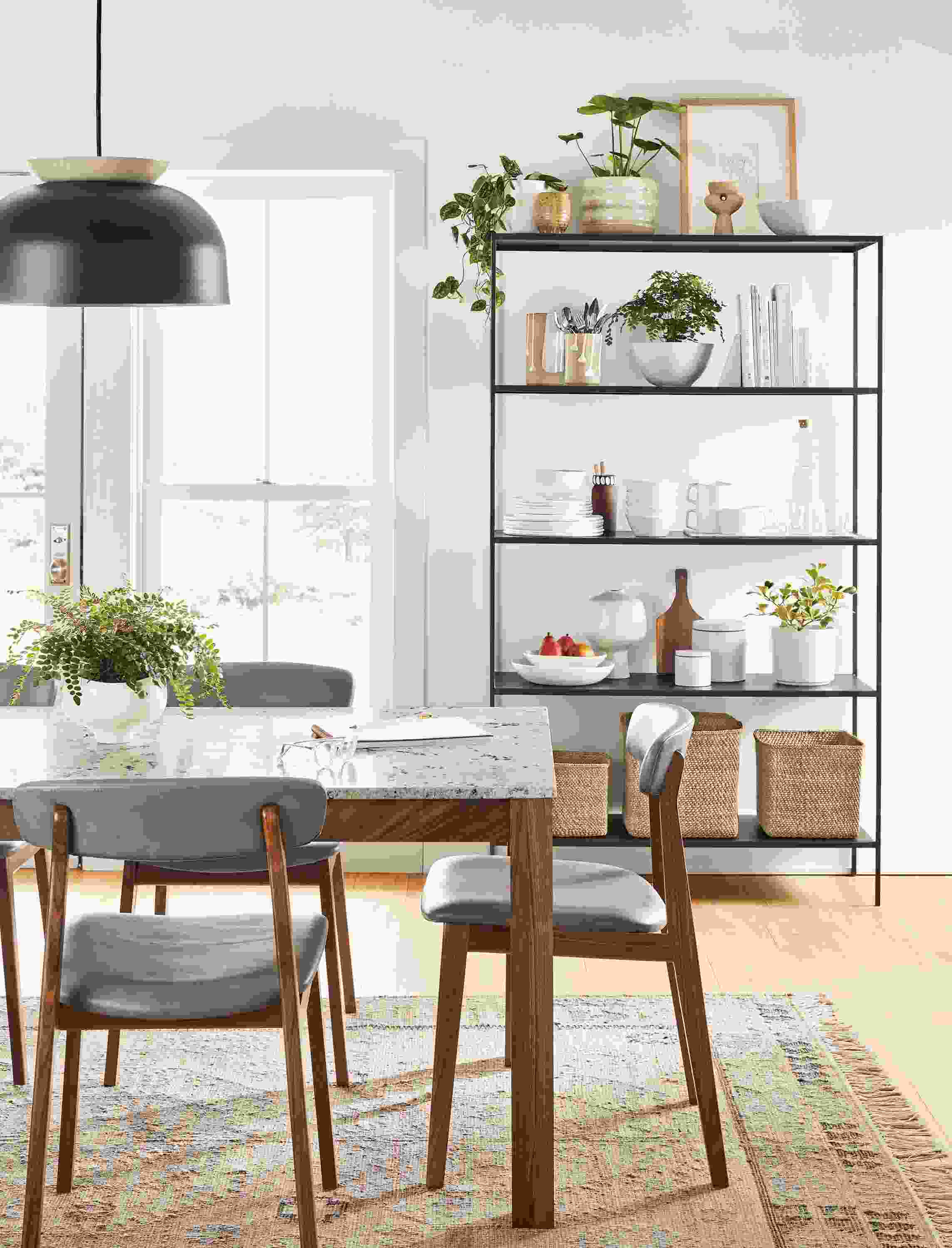 dining room with linden dining table with walnut base and quartz top